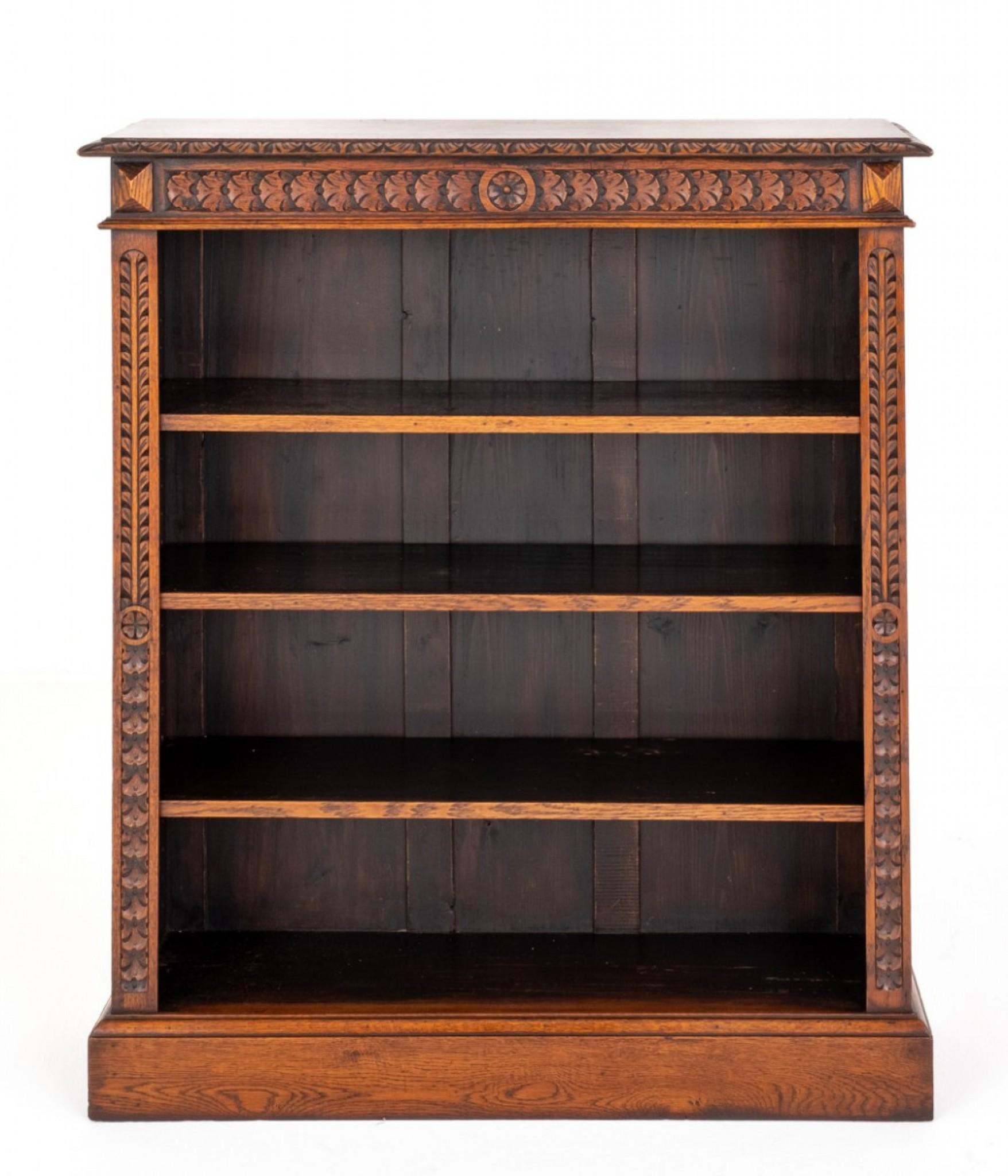 Victorian Carved Oak Open Open Bookcase.
This Bookcase Stands Upon a Plinth Base.
The Bookcase Features 3 Adjustable Shelves Flanked by Carved Uprights.
The Frieze Also Being of a Carved Form.
Presented in Good Condition.