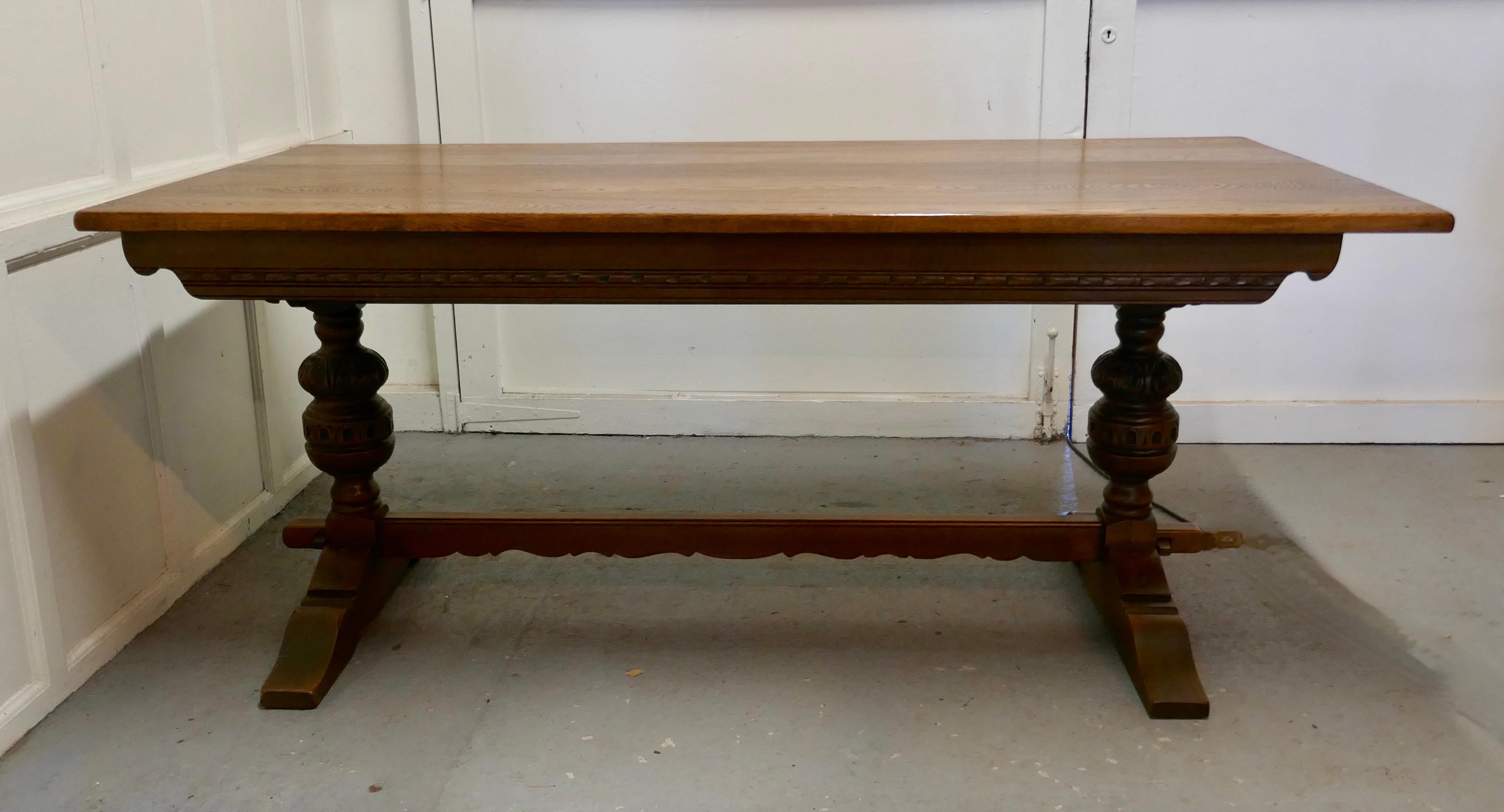 Victorian oak refectory table.

This is a good sturdy table, it has a solid 1” thick oak top made and it has a good natural patina, the legs are in the refectory style carved with a floor Stretcher and bulbous 
The table is good and sound and it