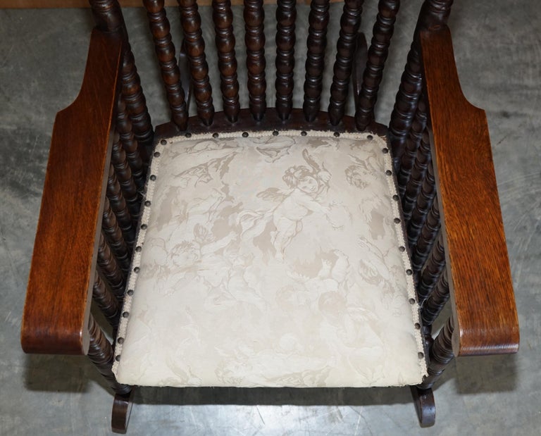 Victorian Oak Rocking Chair with Scottish Bobbin Turnings All over Cherub Fabric For Sale 5