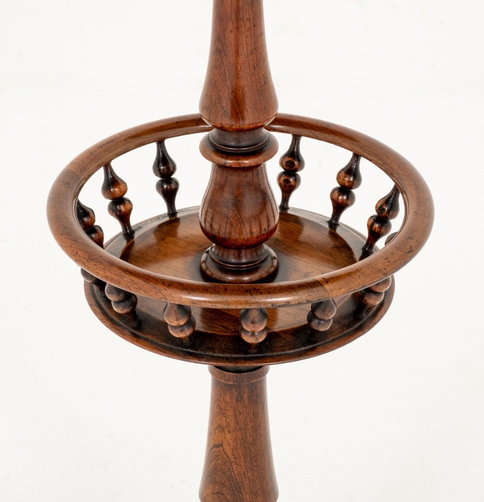 Very Unusual Victorian Rosewood Occasional Table.
Having a Platform base with Bun Feet.
Circa 1850
Featuring ring turned columns and a small galleried basket.
The top having a larger Galleried Basket.
In Excellent Condition
