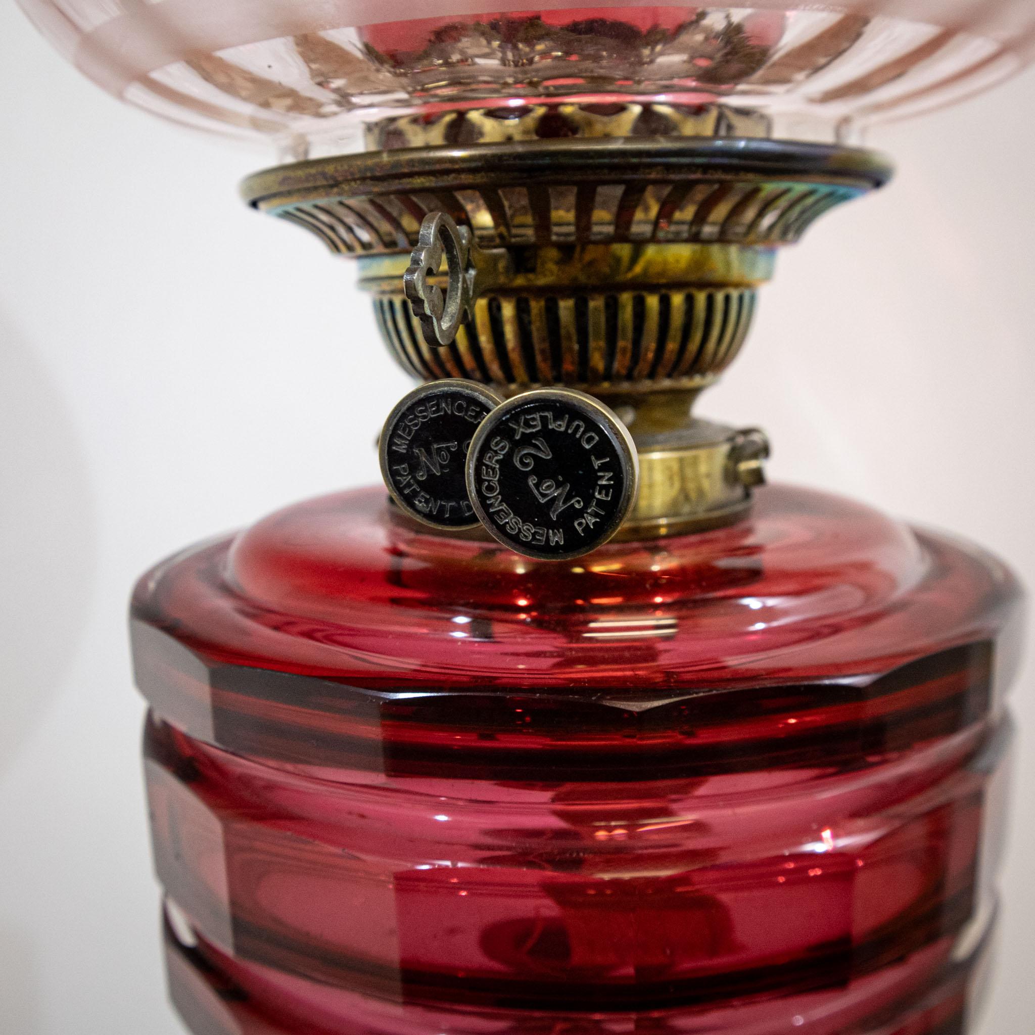 Late 19th Century Victorian Oil Lamp with Original Cranberry Glass For Sale