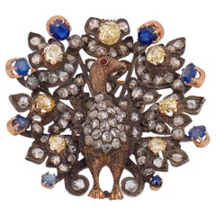 Victorian old cut diamond sapphire iron silver peacock brooch