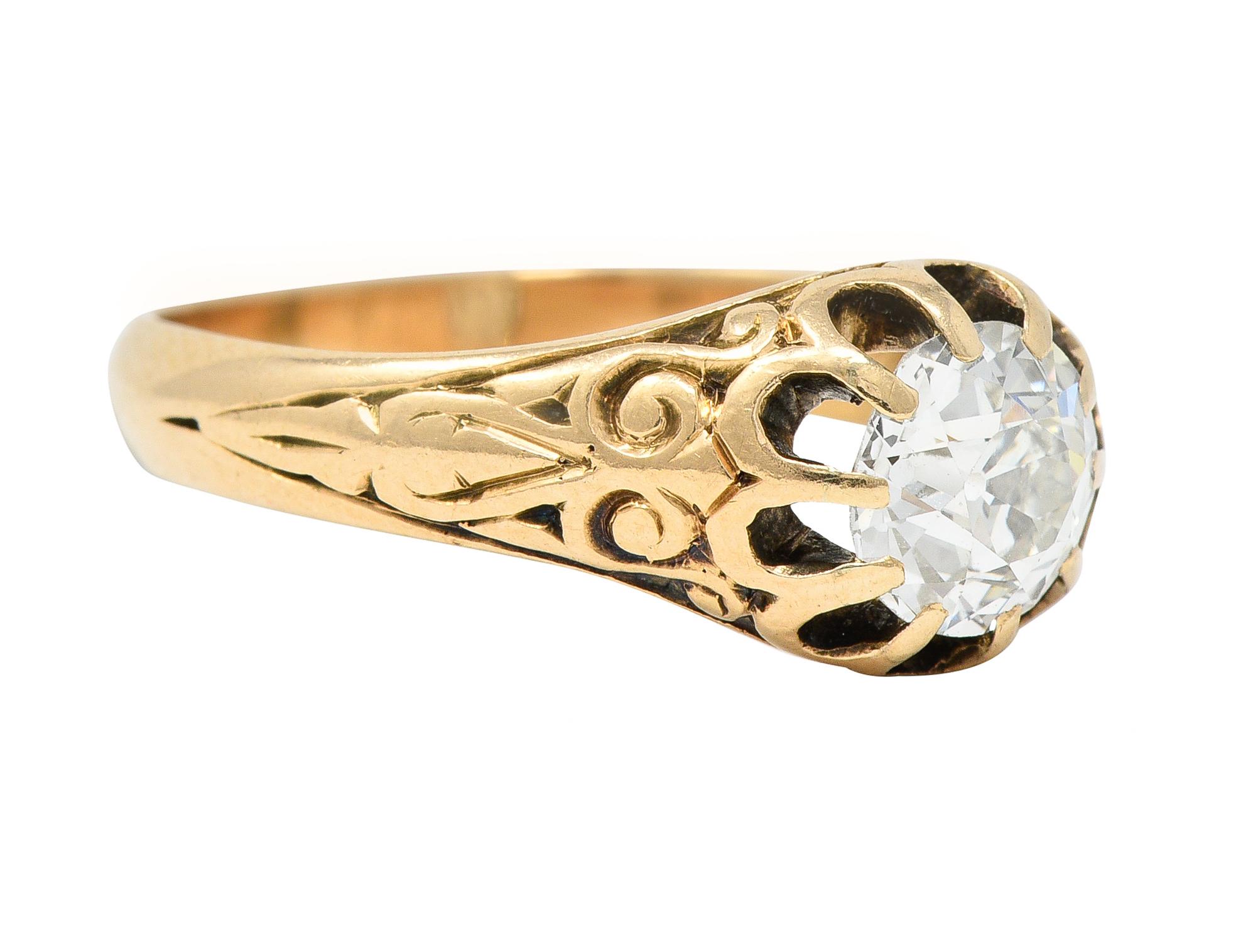 Centering an old European cut diamond weighing approximately 0.86 carat
I color with VS1 clarity - set with belcher style prongs
Flanked by grooved scroll and foliate motif shoulders
Stamped 14k for 14 karat gold
Circa: 1880's
Ring size: 5 1/4 and
