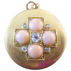 Victorian Old European Cut Diamond and Coral Locket in 18 Carat Yellow Gold