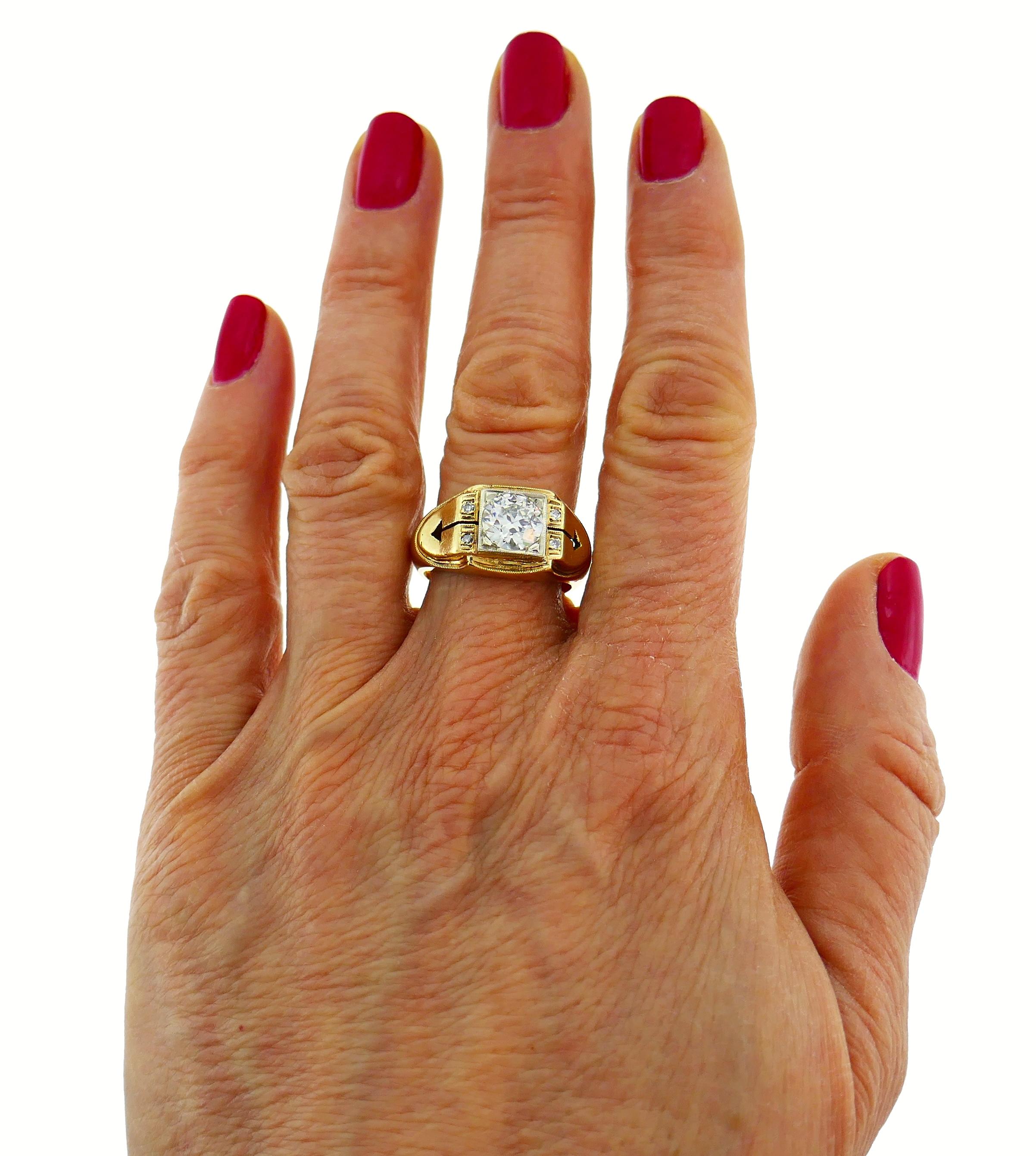 Lovely Victorian unisex ring featuring an approximately 1.50-carat Old European cut diamond (J-K color, VS2 clarity) set in 14 karat gold and accented with four single cut diamonds.
Size 9, can be re-sized.
Weight 7.3 grams.
Top part measures 1/2 x