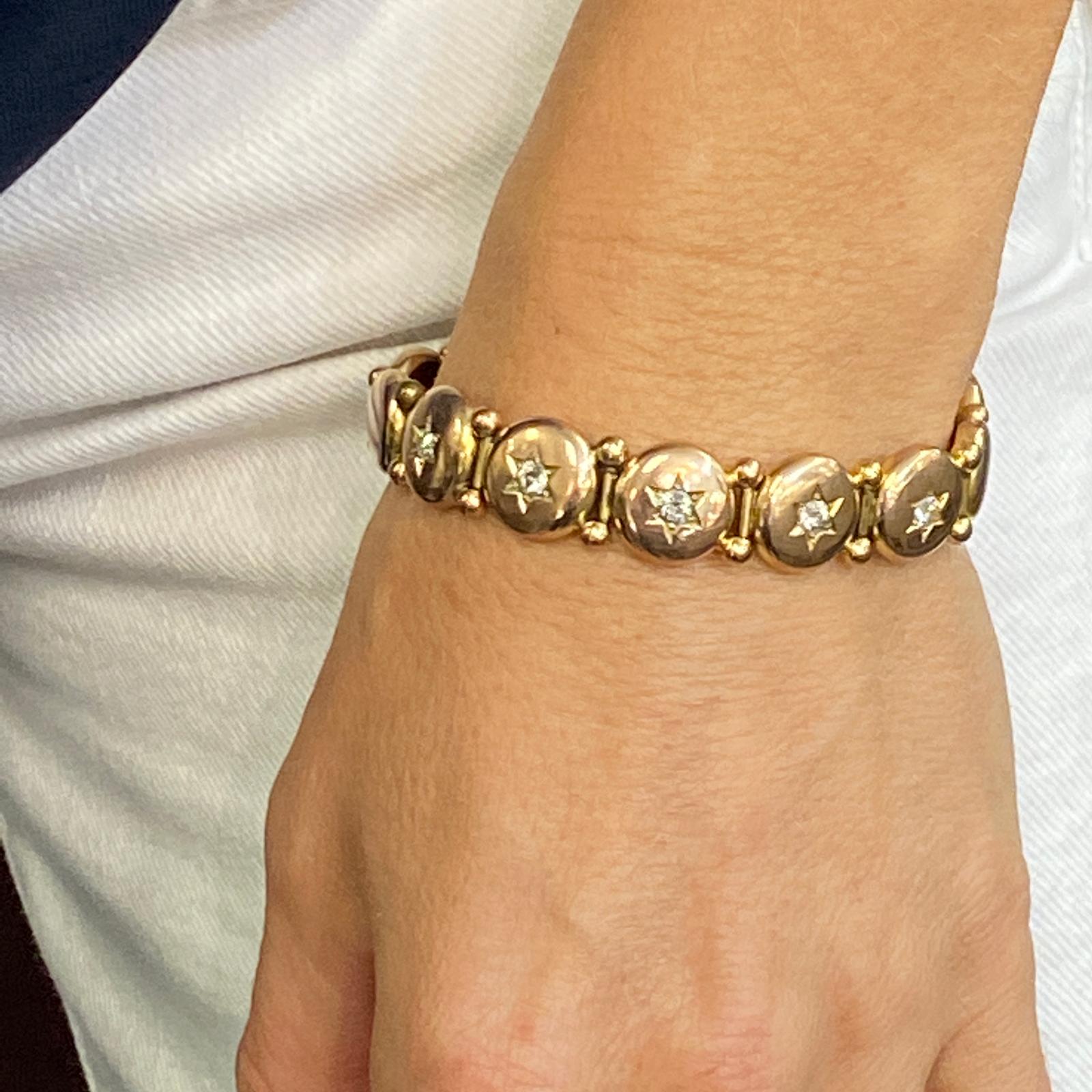 Fabulous Victorian diamond star button bracelet fashioned in 14 karat yellow gold. This original bracelet is in great condition and features 5 Old Mine cut diamonds that equal approximately 1.00 carat total weight. The bracelet measures 6.75 inches