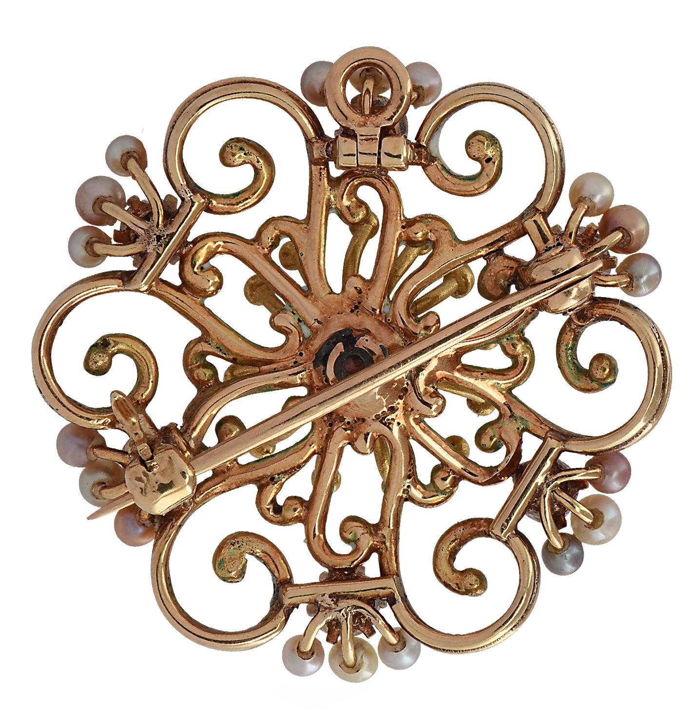 Sensational Victorian brooch pin crafted in yellow gold and enamel, showcasing 6 Mine cut diamonds weighing approximately 0.85 carats total, G color, SI clarity and 19 pearls set in an enchanting flower design, capturing the unparalleled beauty of
