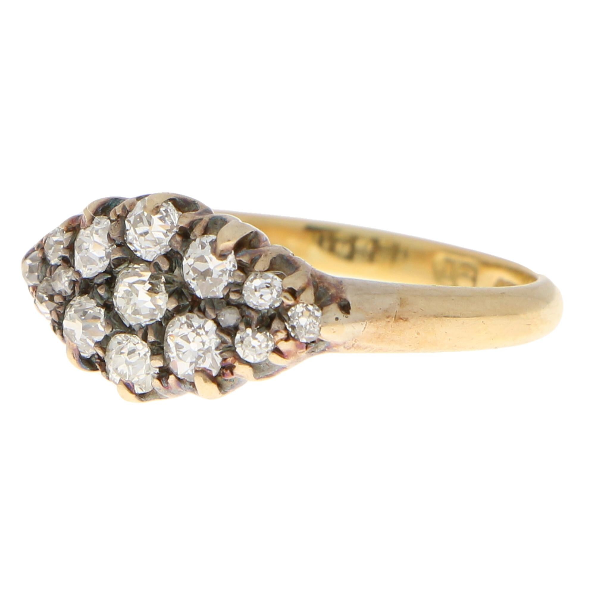 A beautiful Victorian old mine cut diamond cluster ring set in 18k yellow gold.

The ring is claw set with 15 old mine cut diamonds in an elegant horizontal diamond motif. 

Due to the design the piece could be worn for a variety of occasions. It