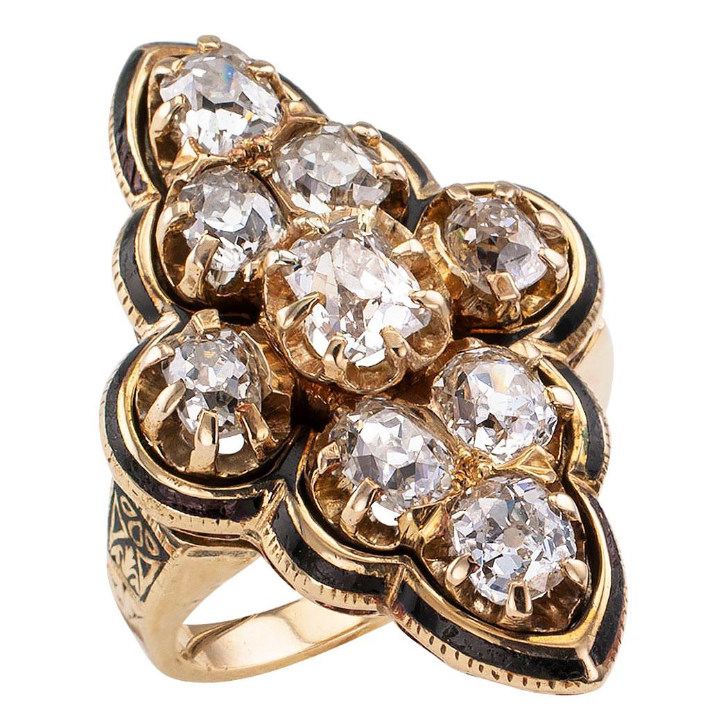 Victorian old mine cut diamond enamel and gold ring circa 1890. The navette-shaped shaped design is set with nine old-mine-cut diamonds totaling approximately 3.10 carats, approximately H – I – J color and SI – I1 clarity, within a scalloped border