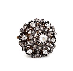 Broche antiguo victoriano de diamantes tallados en mina de plata sobre oro de racimo redondo