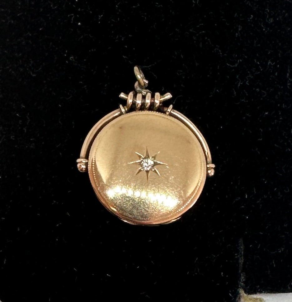 INDULGE IN A GORGEOUS VICTORIAN - BELLE EPOQUE DIAMOND PICTURE LOCKET PENDANT IN WARM 10 KARAT GOLD WITH A GORGEOUS OLD MINE CUT DIAMOND IN THE CENTER.  THE REVERSE IS ADORNED WITH AN ENGRAVED AESTHETIC PERIOD SCENE OF A JAPANESE MOUNTAIN LAKE WITH