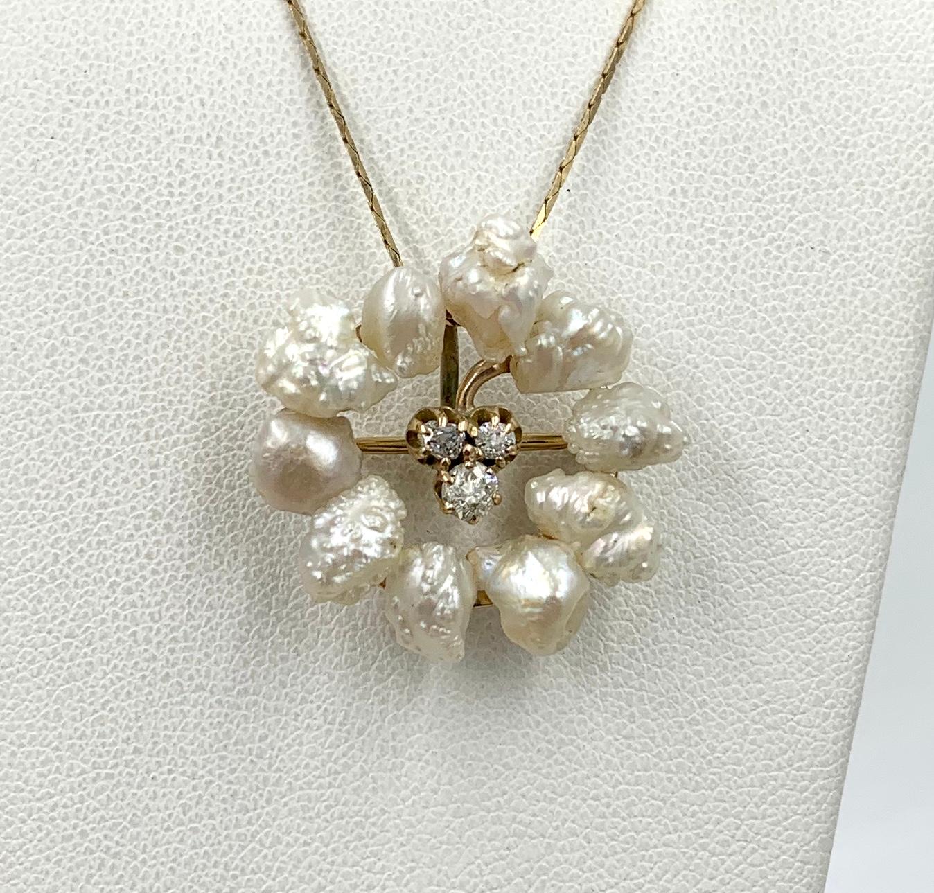 A stunning and very special Victorian - Belle Epoque three leaf Clover Shamrock Pendant with Old Mine Cut Diamonds and spectacular Pearls set in 14 Karat Gold.  In the center of the pendant/brooch is a three leaf clover motif which is set with three