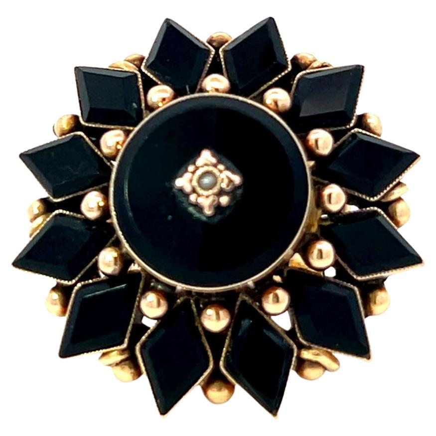 Exquisite Victorian Era Antique Onyx and Seed Pearl Diamond-Shape Petal Cocktail Ring, a true relic of a bygone era. Rich with history and timeless elegance, this stunning piece is a prime example of the romantic craftsmanship of the Victorian