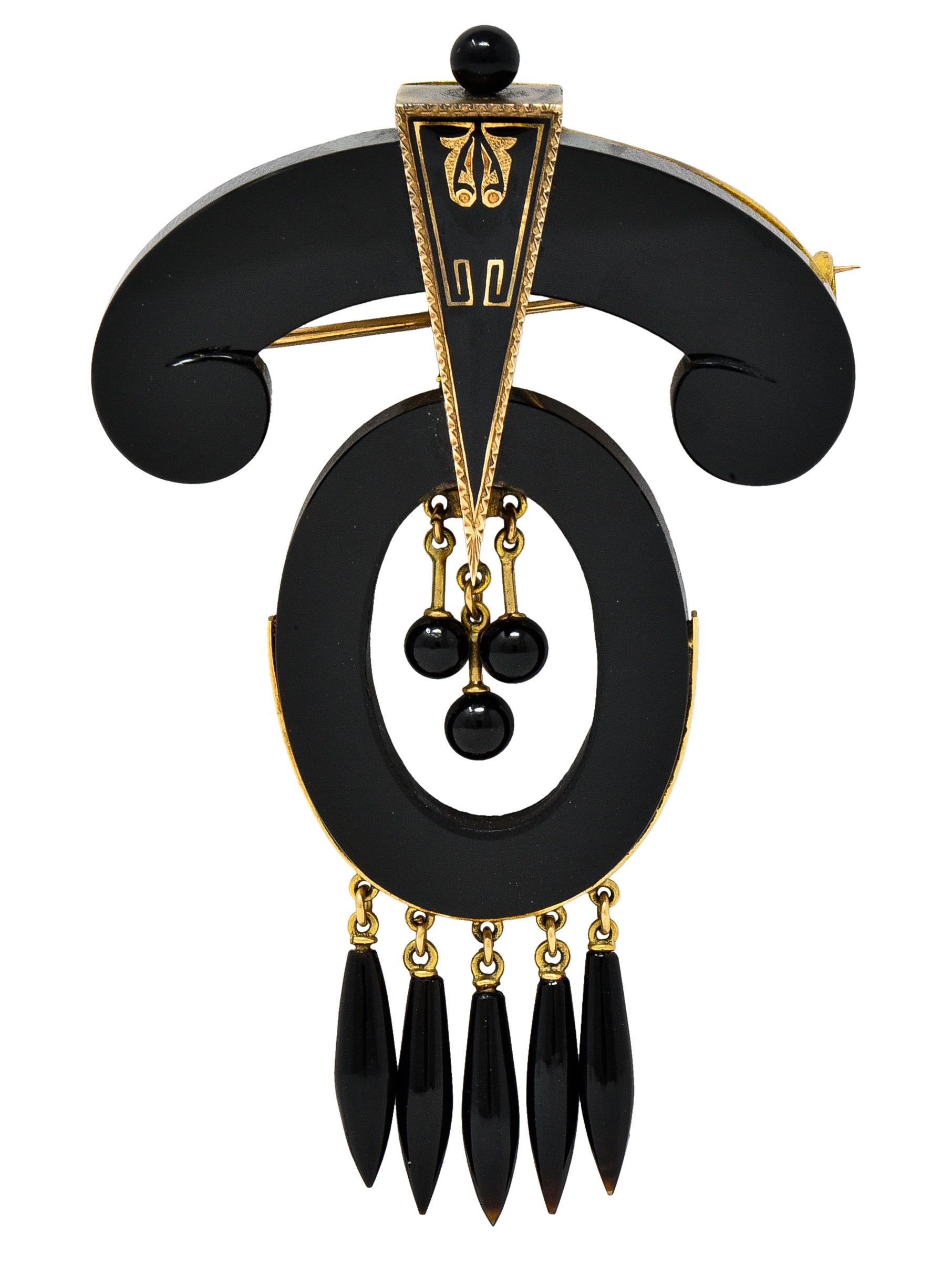 Matching set consists of a pair of earrings and a pendant brooch featuring carved onyx components. Including oval disks, a whiplash form, round beads, and spiculum beads - opaque glossy black. Earrings suspend oval disks from round bead surmounts;