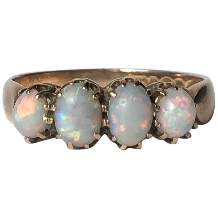 Victorian Opal and 9 Carat Gold Four-Stone Ring