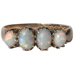 Victorian Opal and 9 Carat Gold Four-Stone Ring