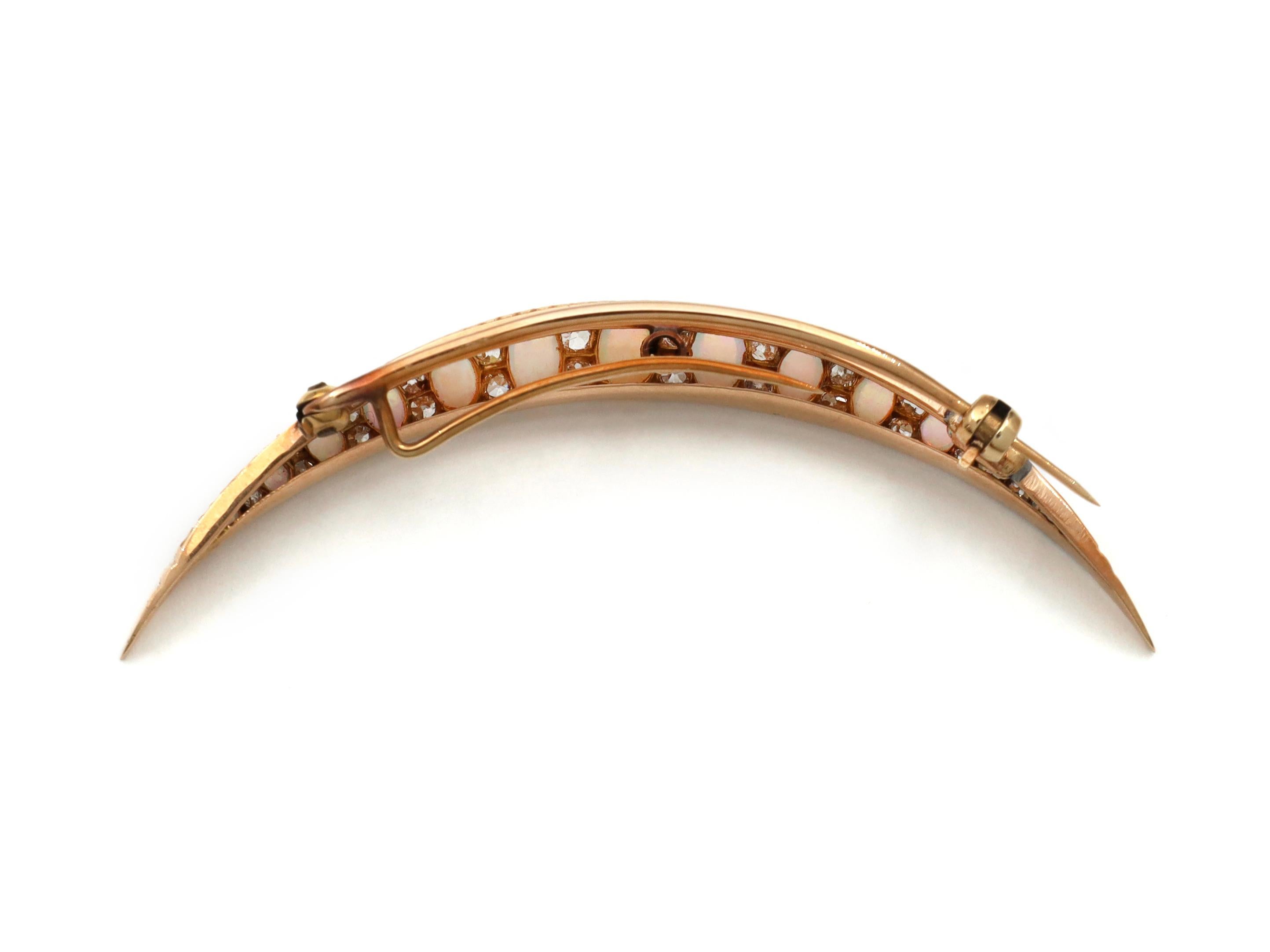 Cabochon Victorian opal and diamond crescent moon brooch in yellow gold