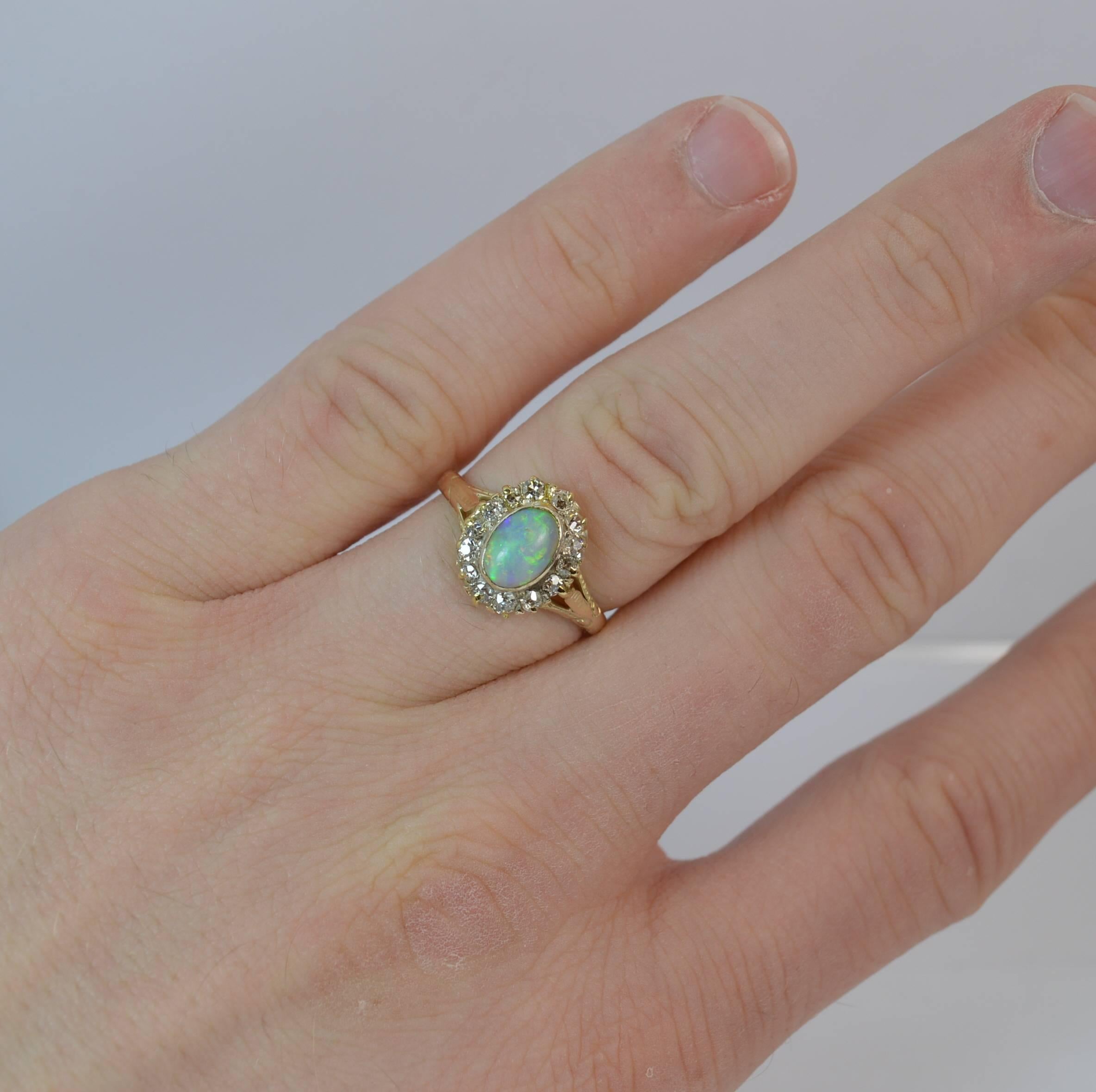 Oval Cut Victorian Opal and Old Cut Diamond 18 Carat Gold Cluster Ring