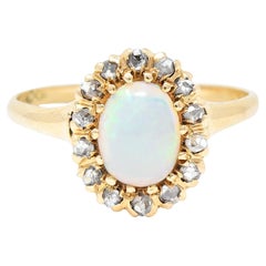 Victorian Opal Cabochon Diamond 14 Karat Yellow Gold Antique Halo Ring