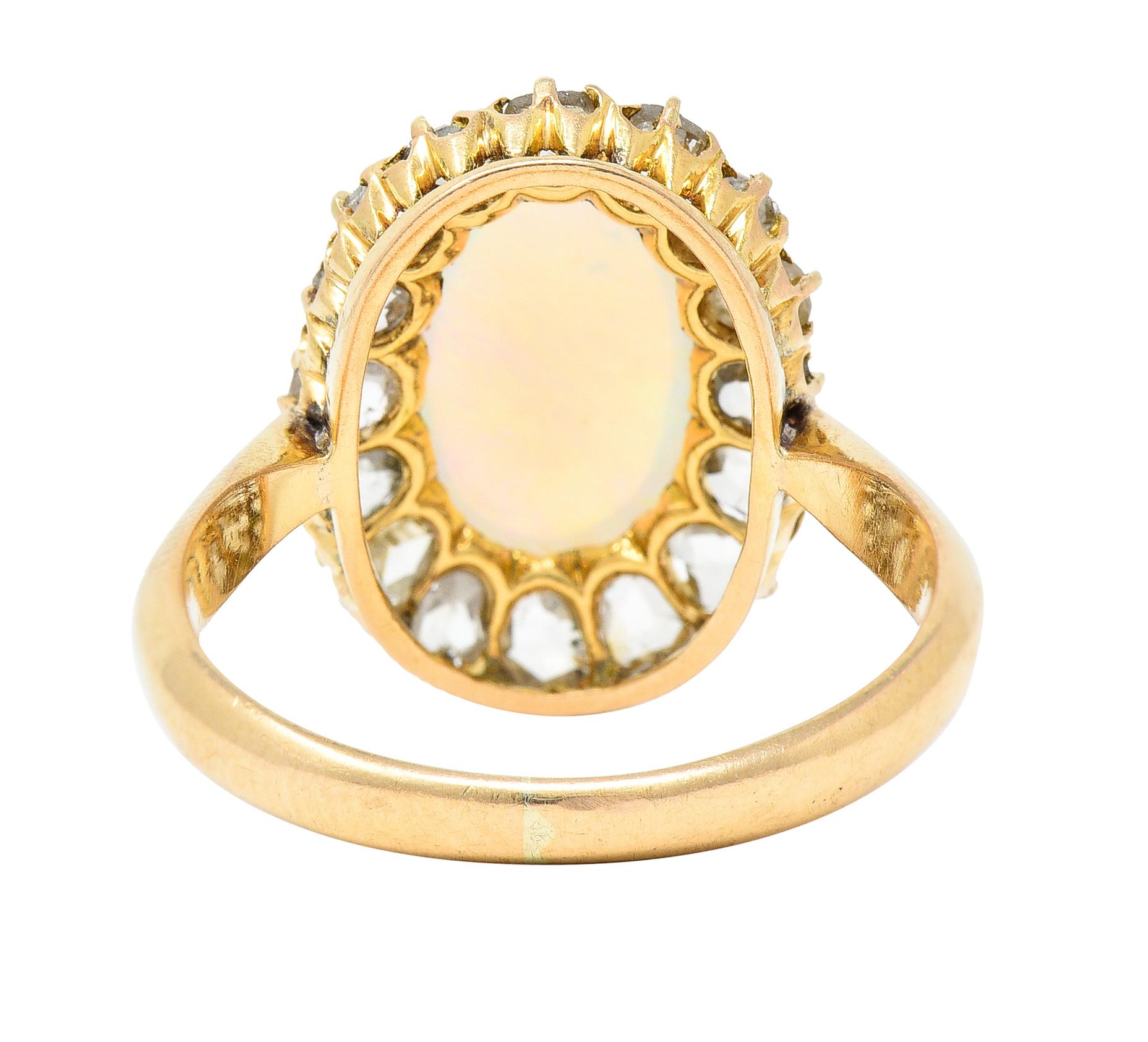 Victorian Opal Cabochon Diamond 18 Karat Yellow Gold Antique Halo Ring In Excellent Condition In Philadelphia, PA