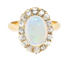 Victorian Opal Cabochon Diamond 18 Karat Yellow Gold Antique Halo Ring