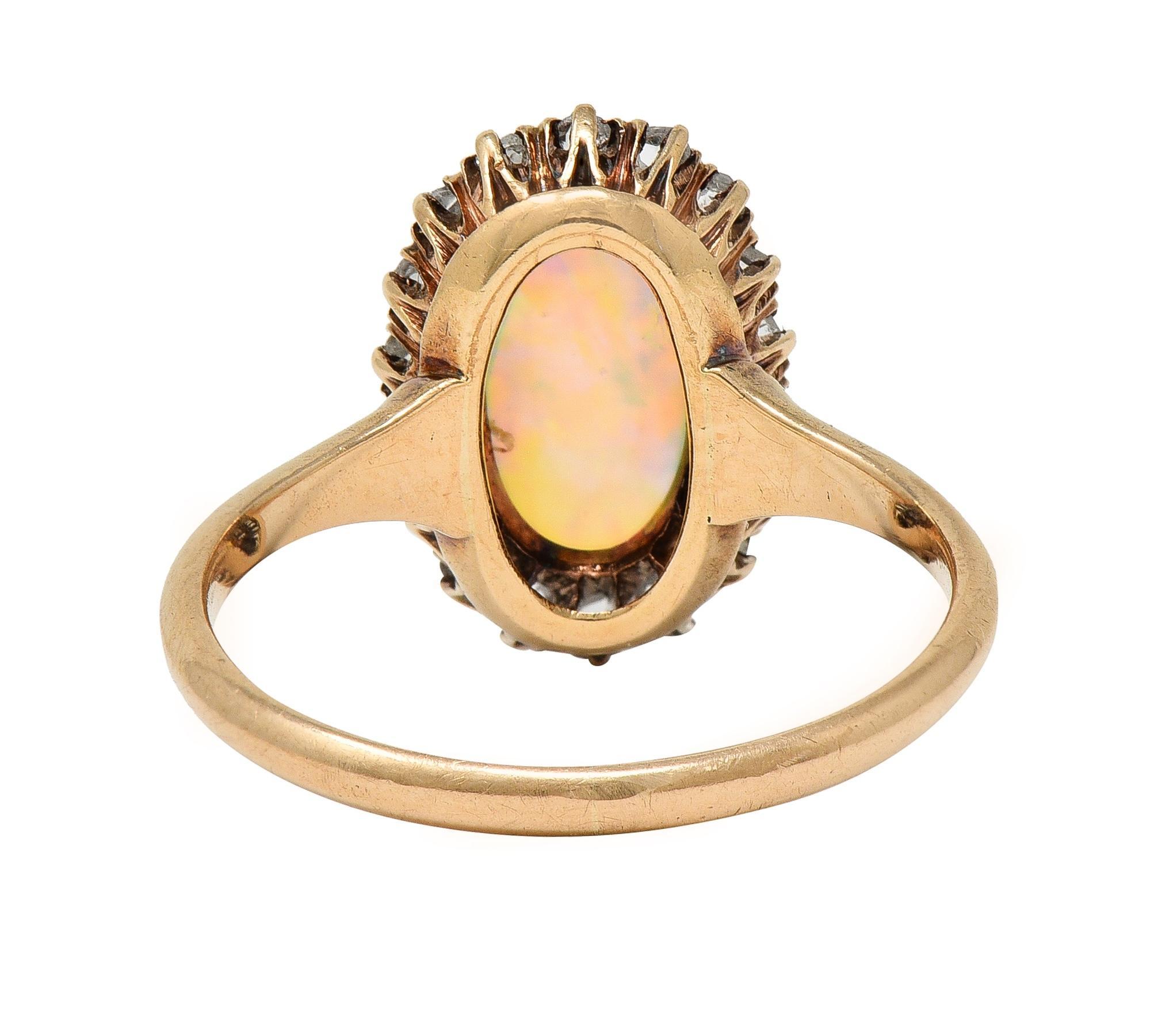 Victorian Opal Diamond 18 Karat Yellow Gold Antique Halo Ring In Excellent Condition In Philadelphia, PA