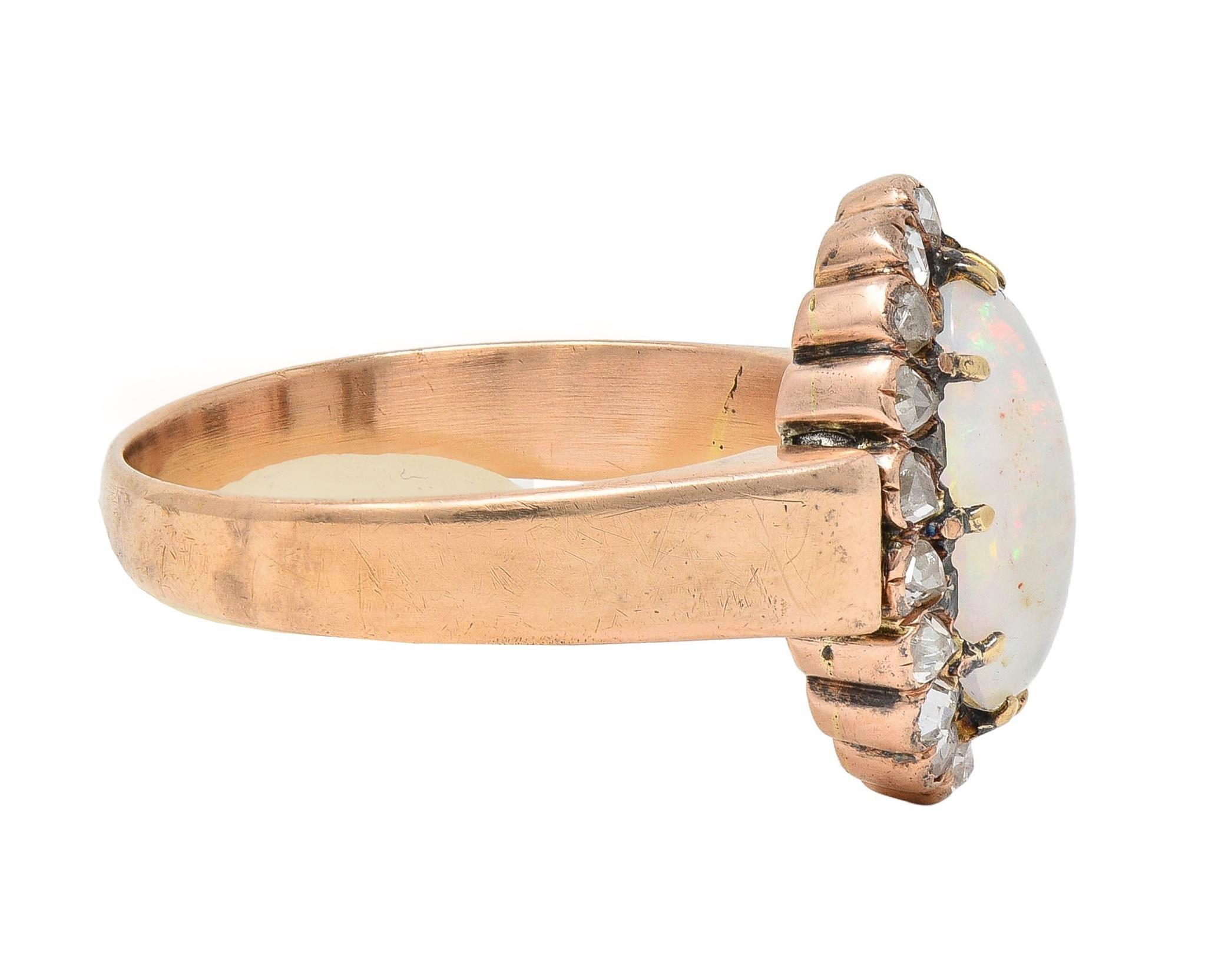 Victorian Opal Rose Cut Diamond 14 Karat Rose Gold Antique Halo Ring In Excellent Condition In Philadelphia, PA