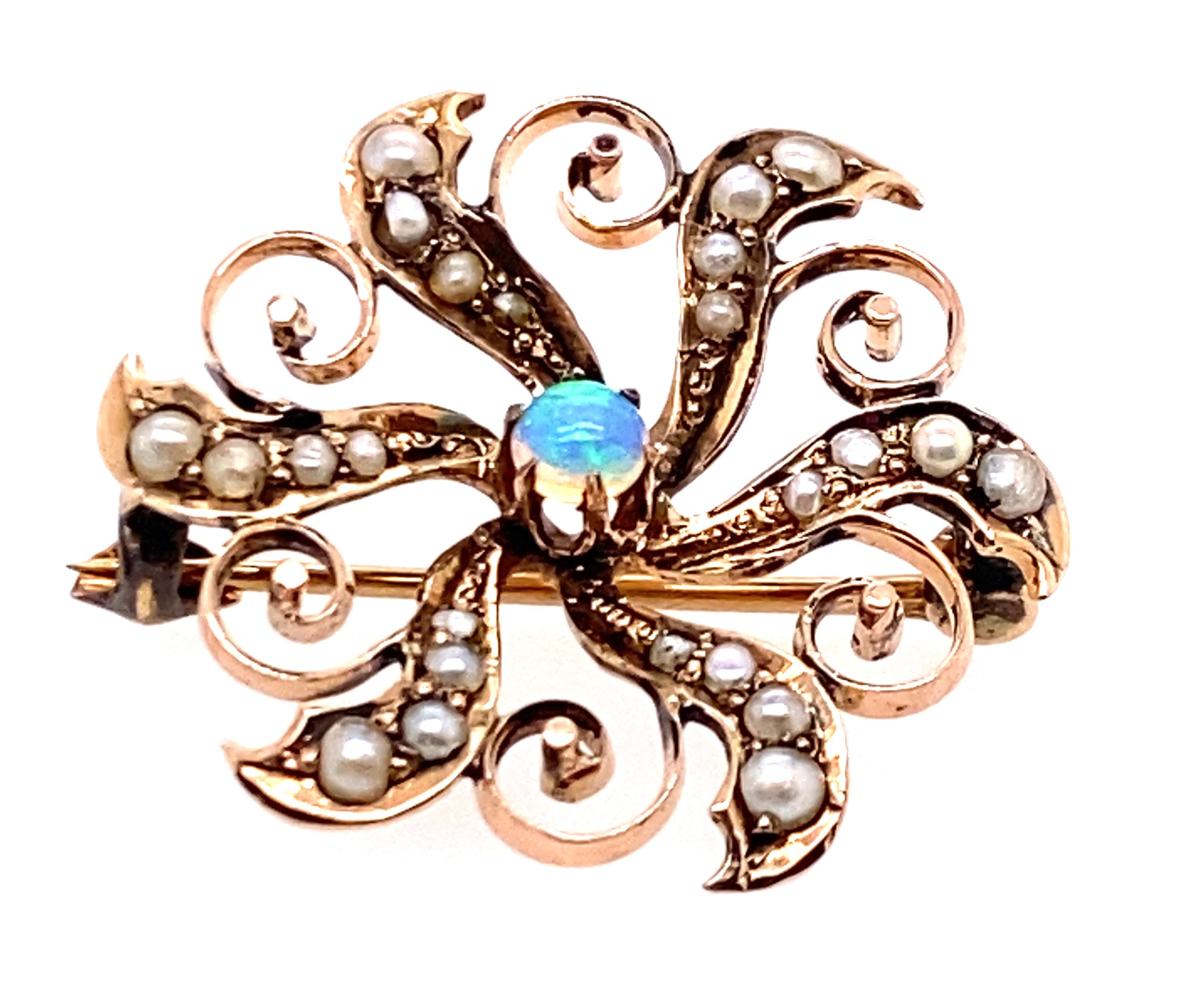 Viktorianische Opal Saatperle  14K Gelbgold Vintage Antike Brosche Pin



Verfügt über einen 3,6 mm runden Cabochon Fiery Opal Center Stein

100% natürlicher Opal Edelstein & Perlen 

Massiv 14K Gelbgold

CIRCA 1880er Jahre

Das viktorianische