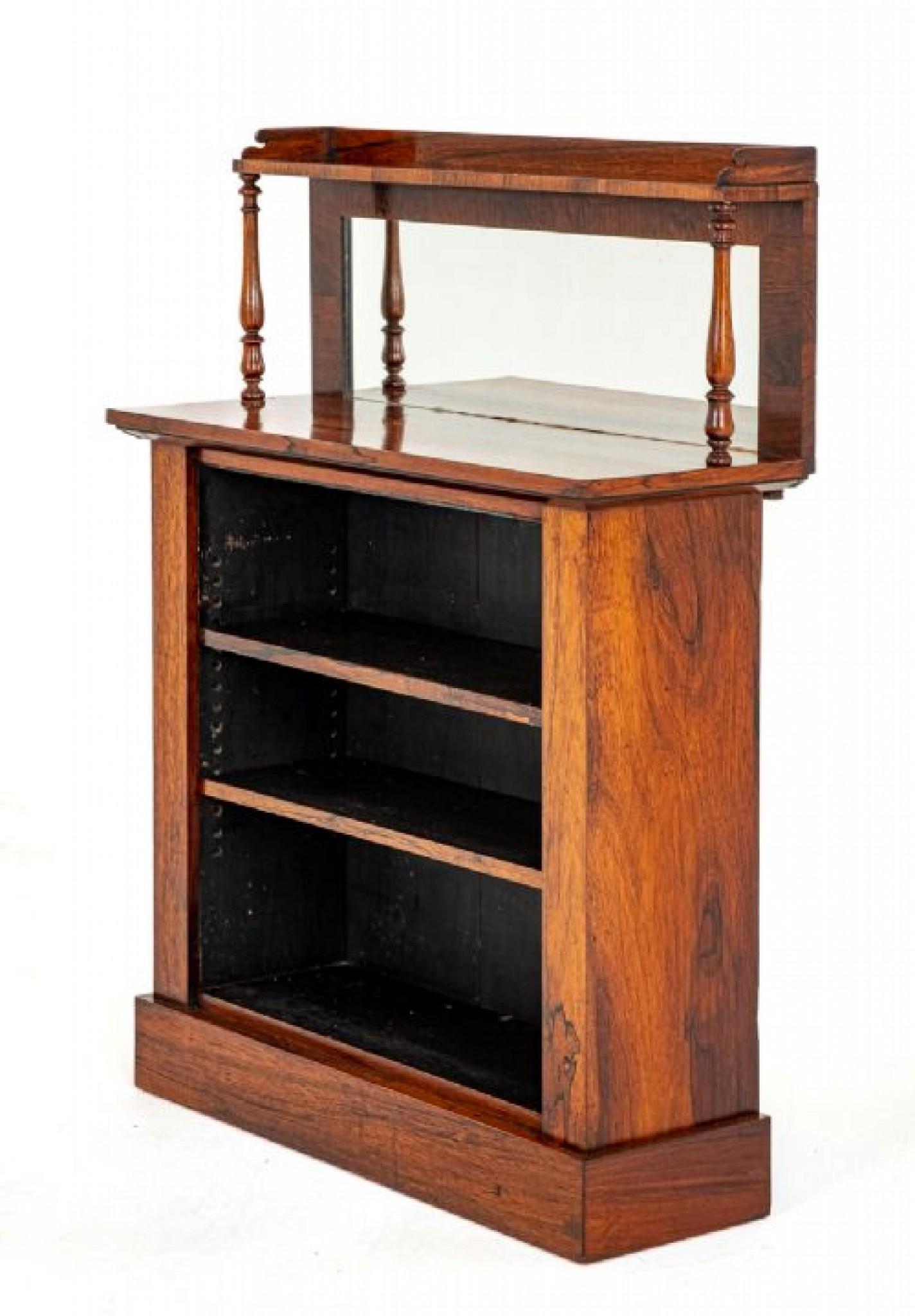 Unusual Early Victorian Open Bookcase.
This Bookcase is Raised Upon a Plinth Base.
Period Victorian
Having 2 Adjustable Shelves.
The Top Section is Supported on Turned Columns with a small Upstand and a Mirrored Back.
Presented in Good Condition.