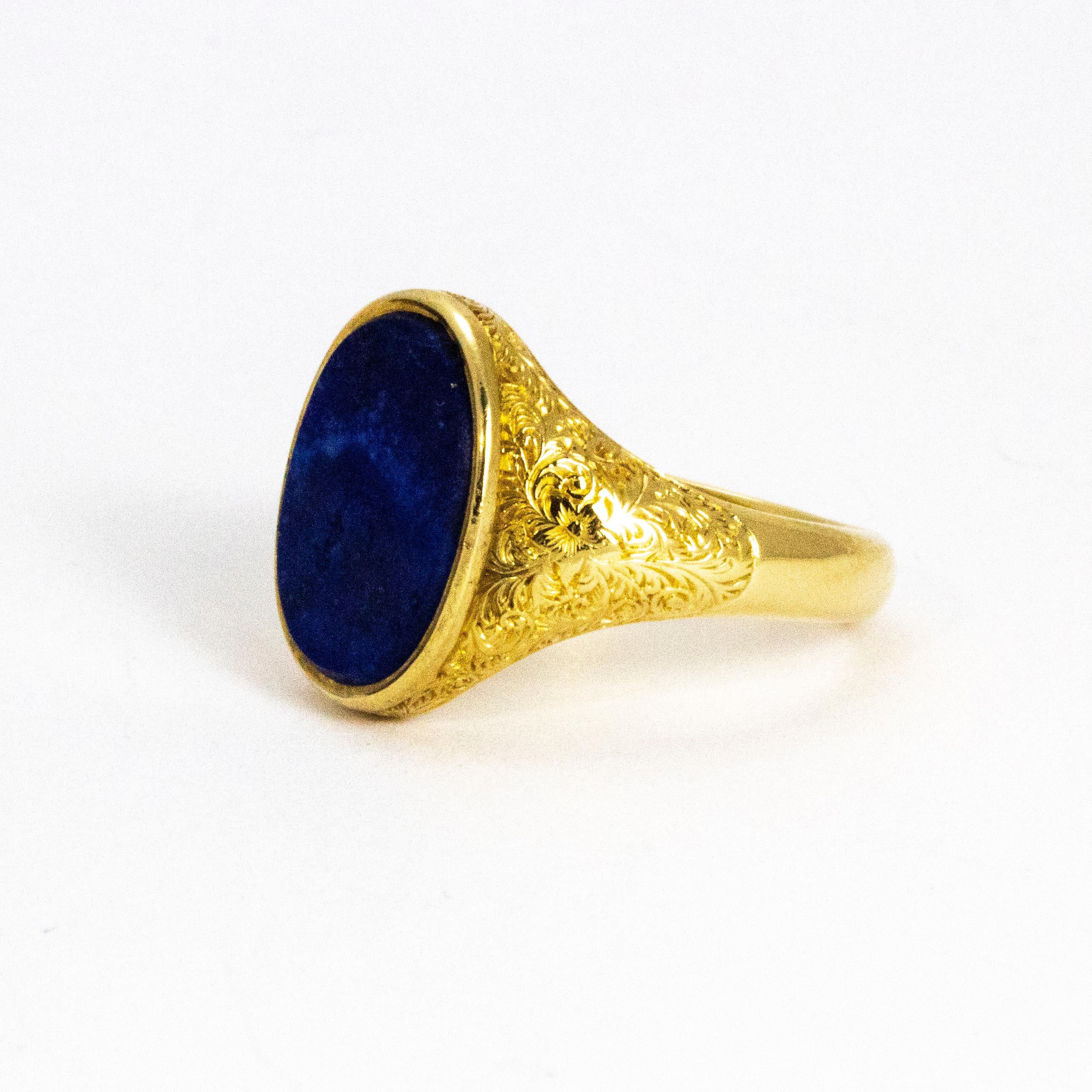 A stunning antique Victorian signet ring set with a beautifully coloured flat cut lapis. The surroundings of the stone and shoulders are wonderfully detailed with ornate foliate motifs. Modelled in 18 karat yellow gold.

Ring Size: L or 6