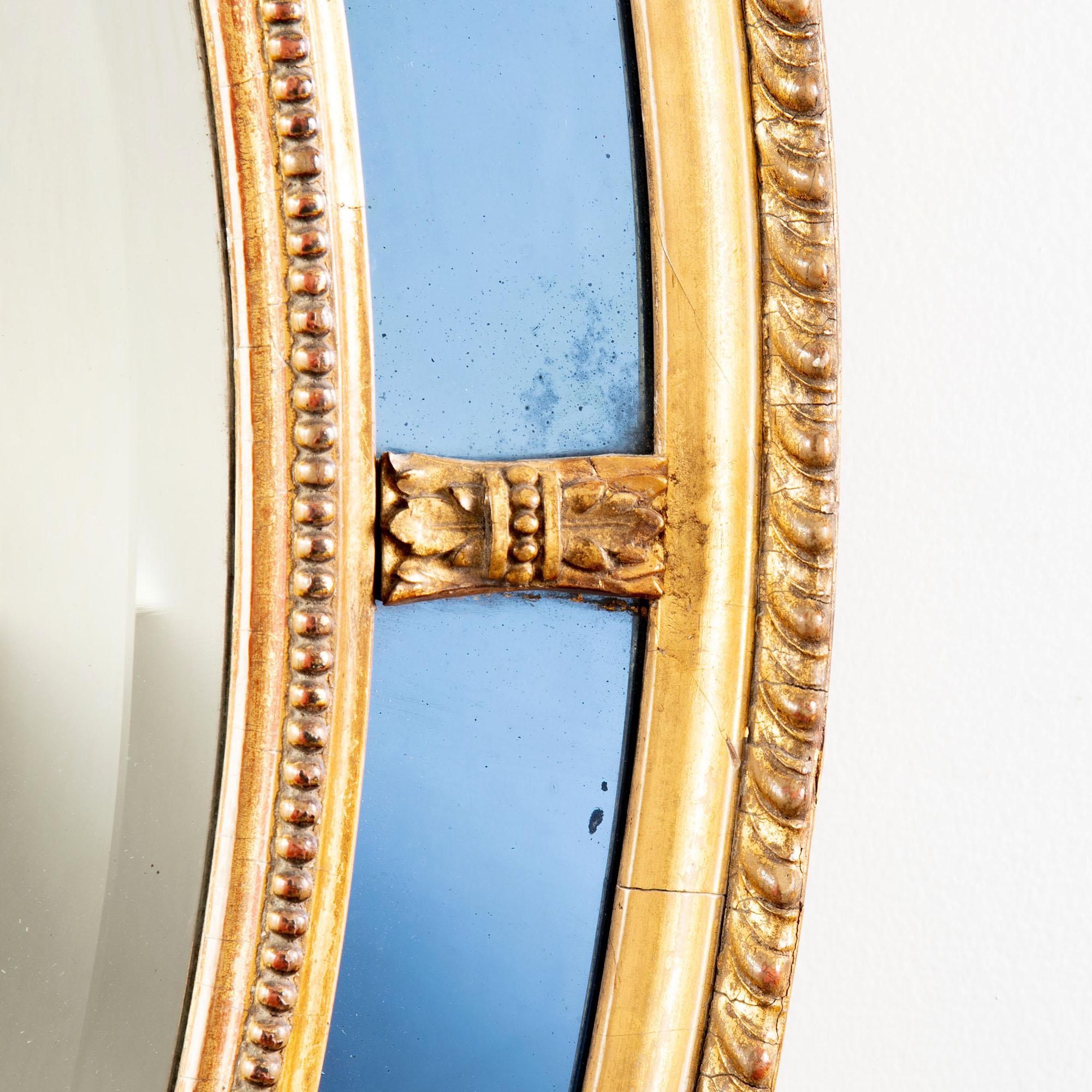 English Victorian Oval Blue Glass and Giltwood Border Wall Mirror