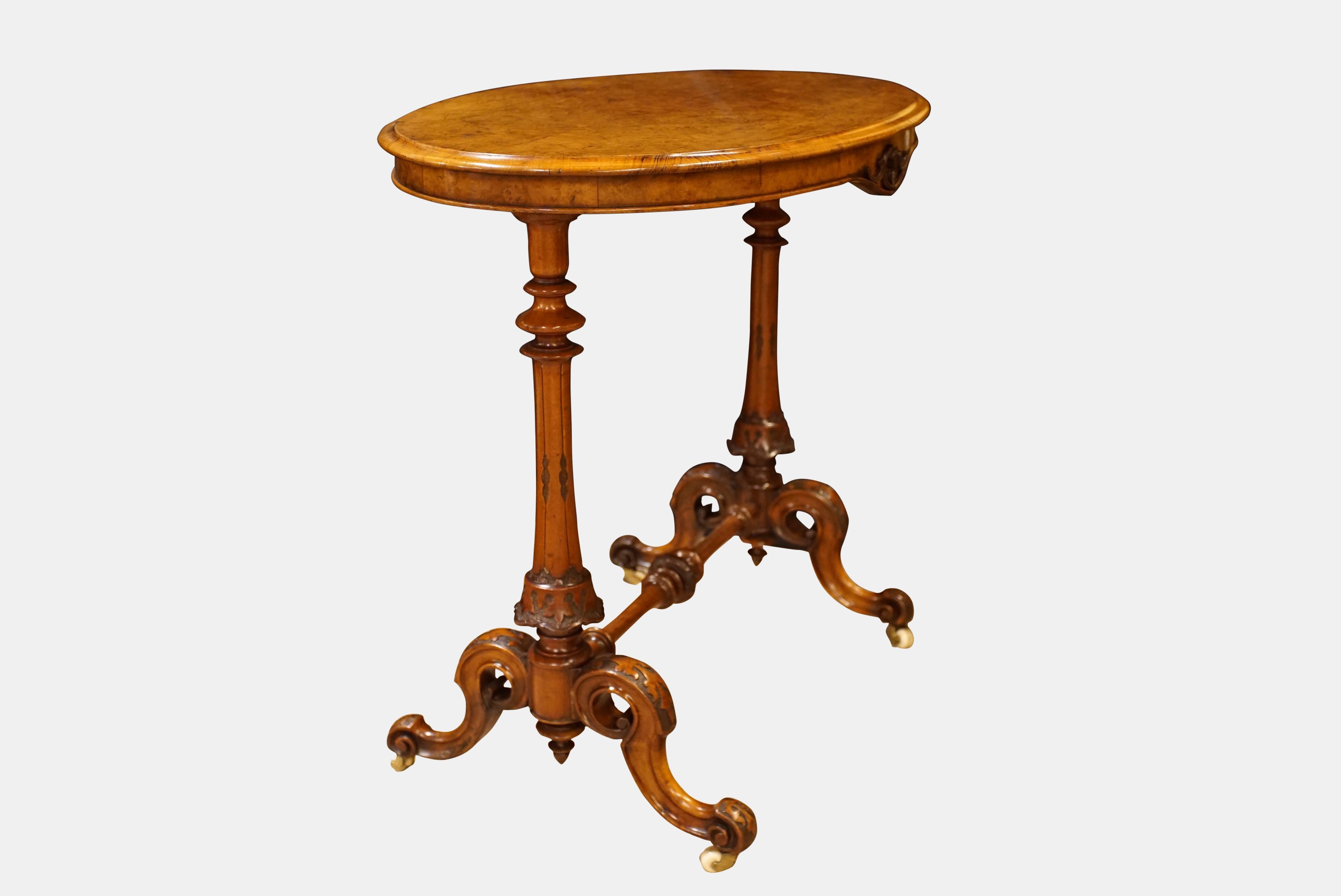 Victorian Oval burr walnut occasional table.

circa 1865.