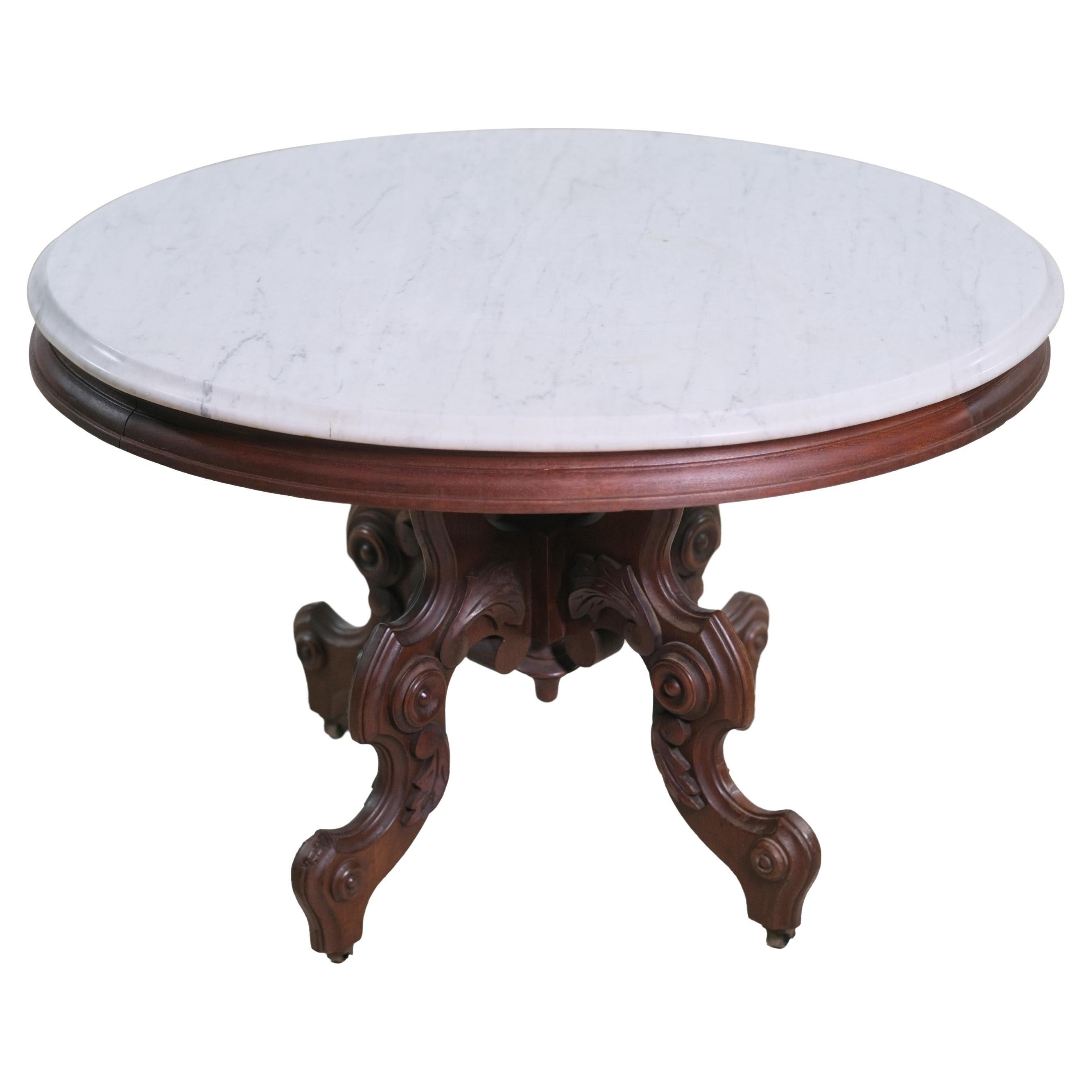Victorian Oval Mahogany Coffee Table with Marble Top + Casters For Sale