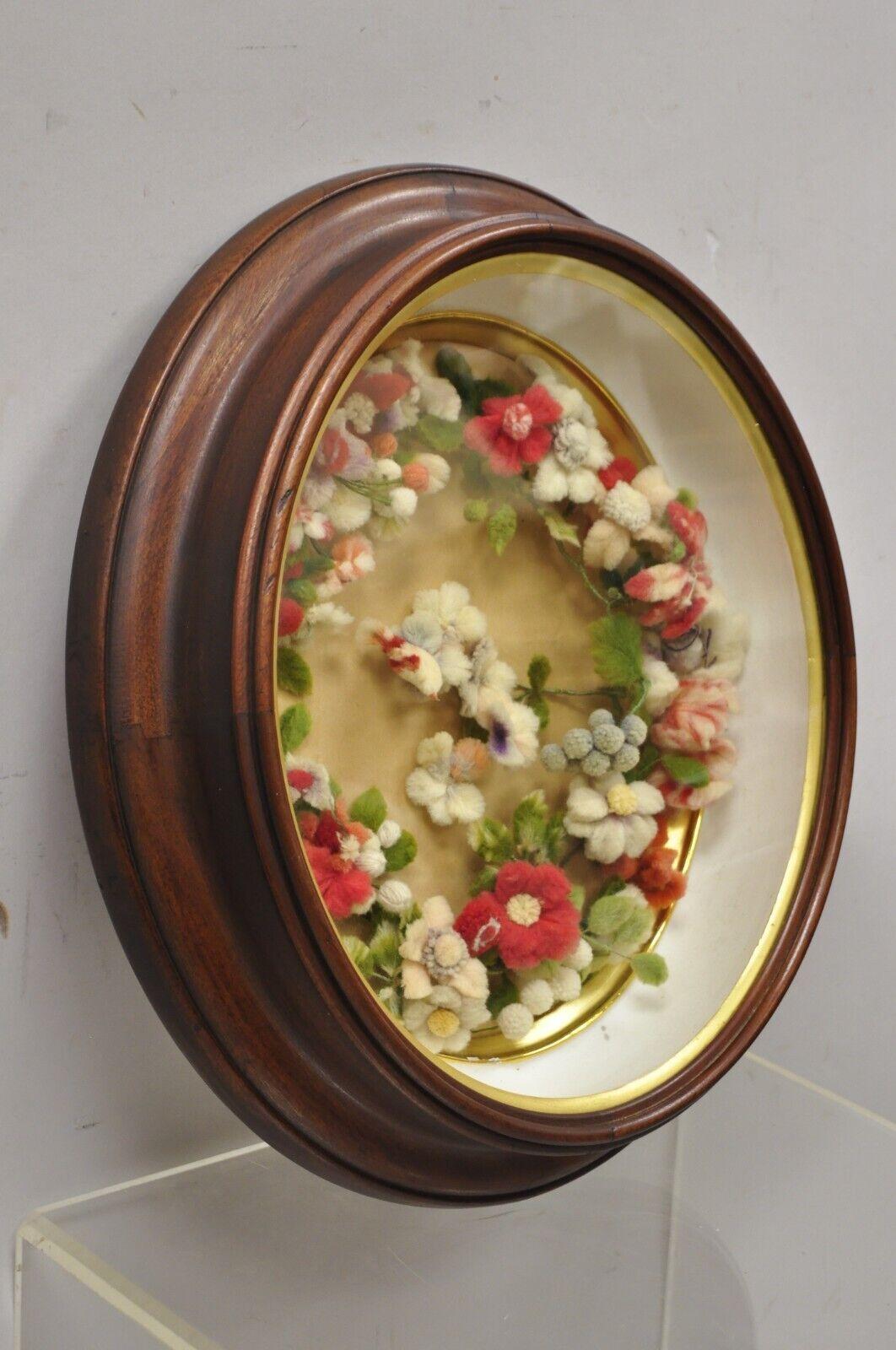 Antique Victorian oval mahogany shadow box frame felt cotton flower mourning wreath. Item features a wonderful oval mahogany frame, felt/cotton flowers. Circa 19th Century. Measurements: 18