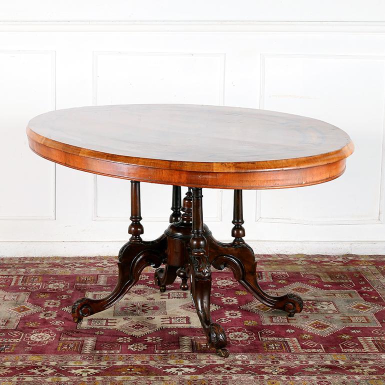 A Victorian, burl walnut, oval, flip-top Loo table, perfect for dining or for playing cards. It features a parquetry design of inlaid ebony and satinwood, and four scroll supports with original ceramic castors.
Dimensions:
W: 53″
D: 39″
H: 28″