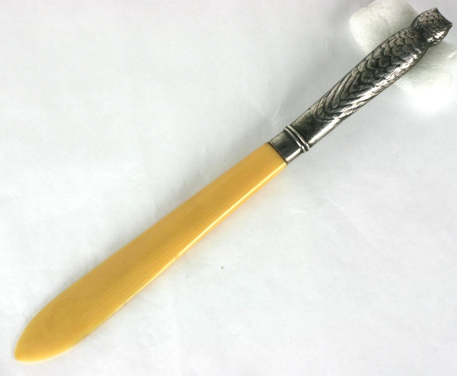 Victorian Owl Letter Opener crafted of 800 grade silver with celluloid and glass eyes. Charming figural, novelty motif from the late 19th Century. Beautiful detailing.
Cap removes to expose blade for opening letters.
1880's Germany. 6.75