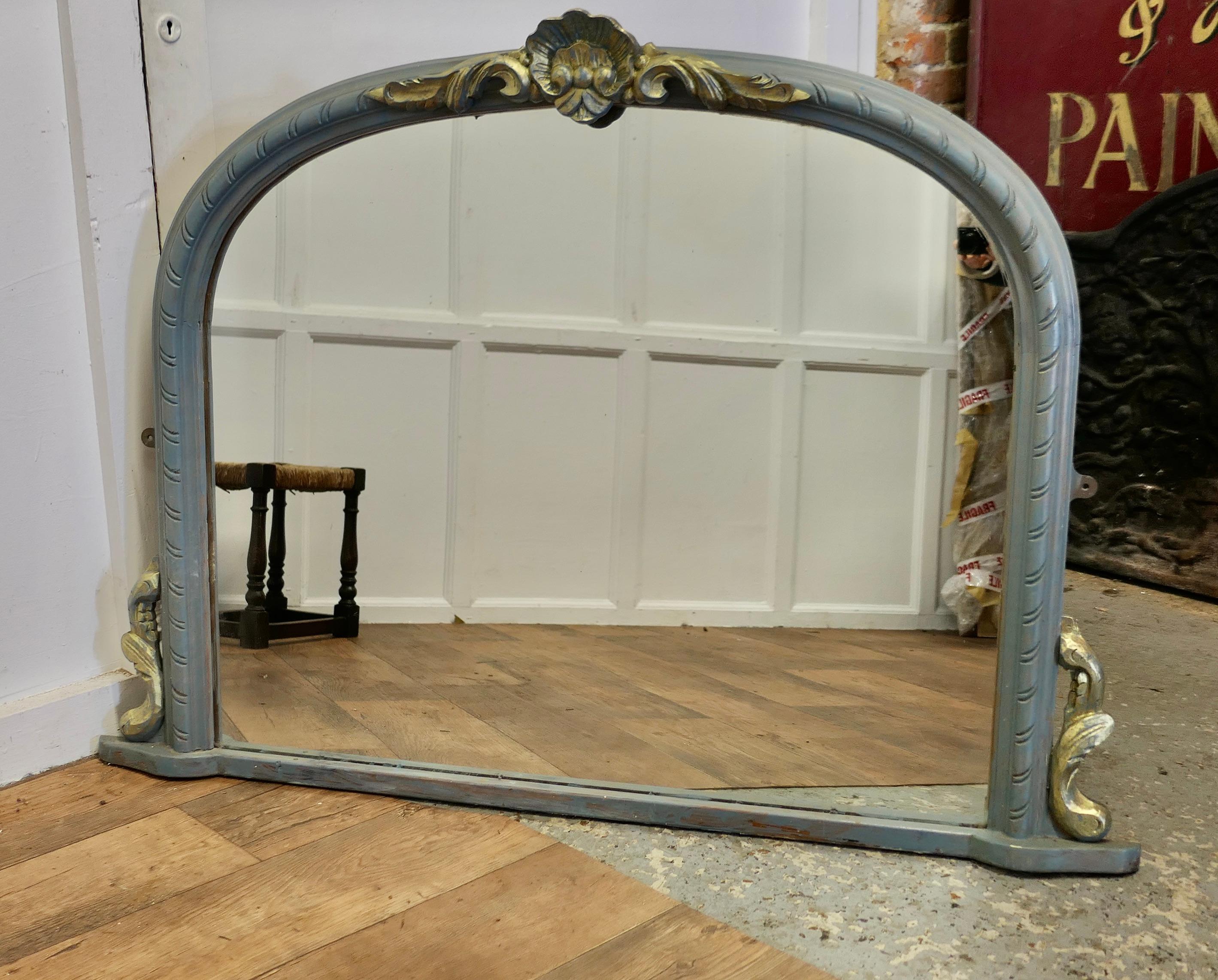 Victorian Painted Arched Overmantel Mirror

A Lovely Over Mantle Mirror painted in blue with gold highlights 

This is a charming piece, the 3” arched moulded frame has a shell and acanthus decoration with a flat base
The Mirror is in good