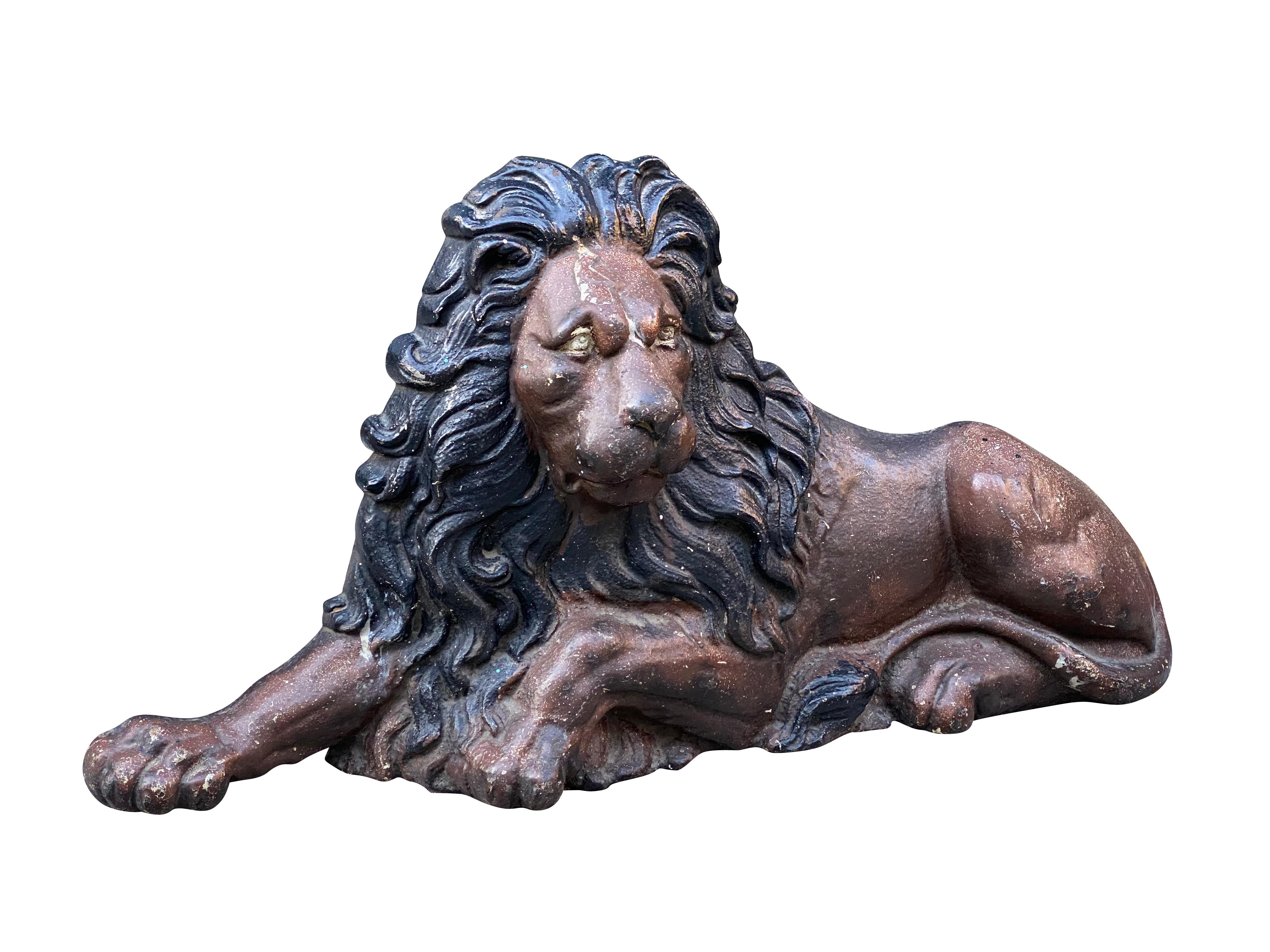 Seated painted brown with black mane. Possibly made as a doorstop.