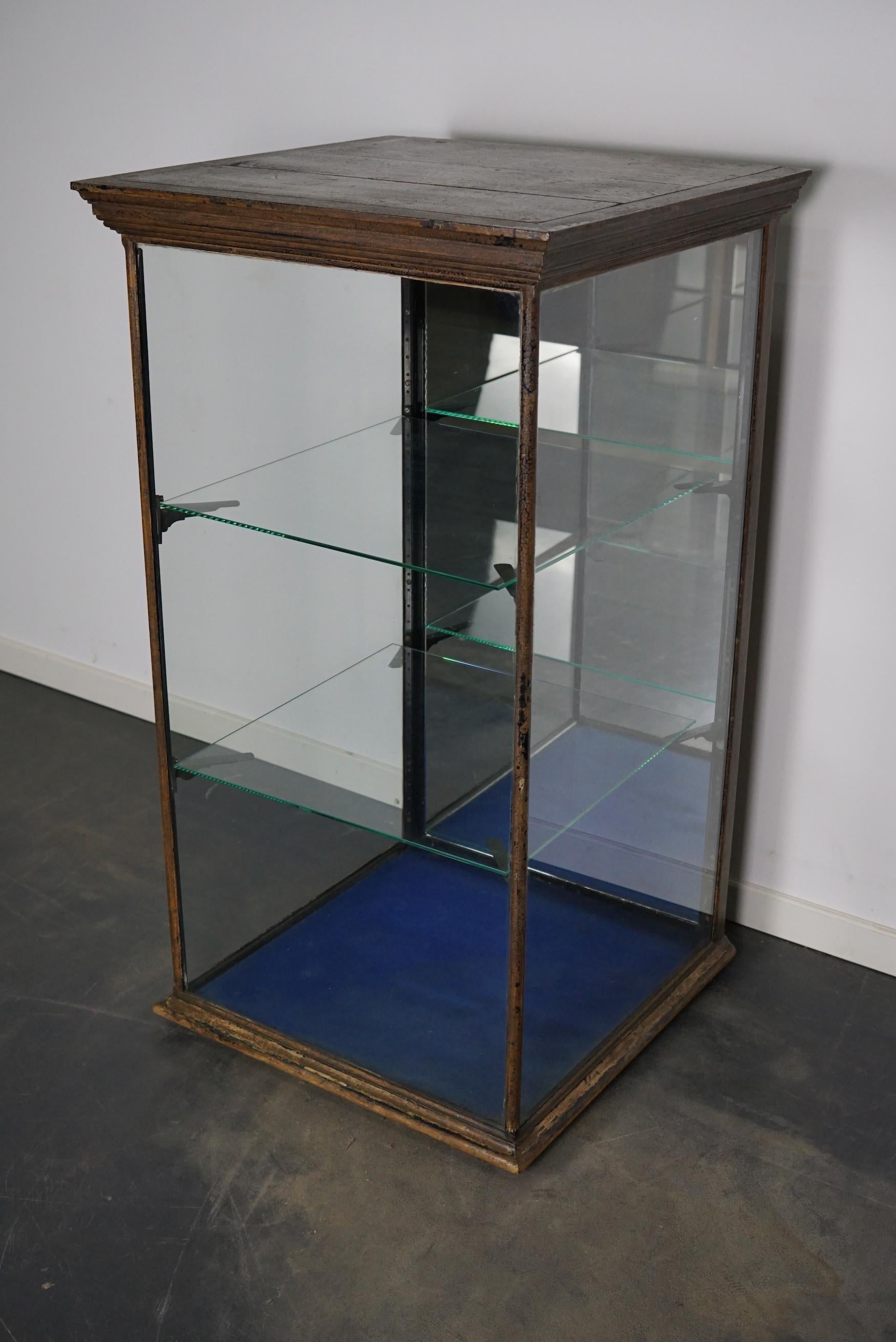 A museum quality Painted Victorian mahogany display cabinet. This outstanding cabinet has a mirrored door fitted with the original handles. It features two shelves on cast brass shelve holders.