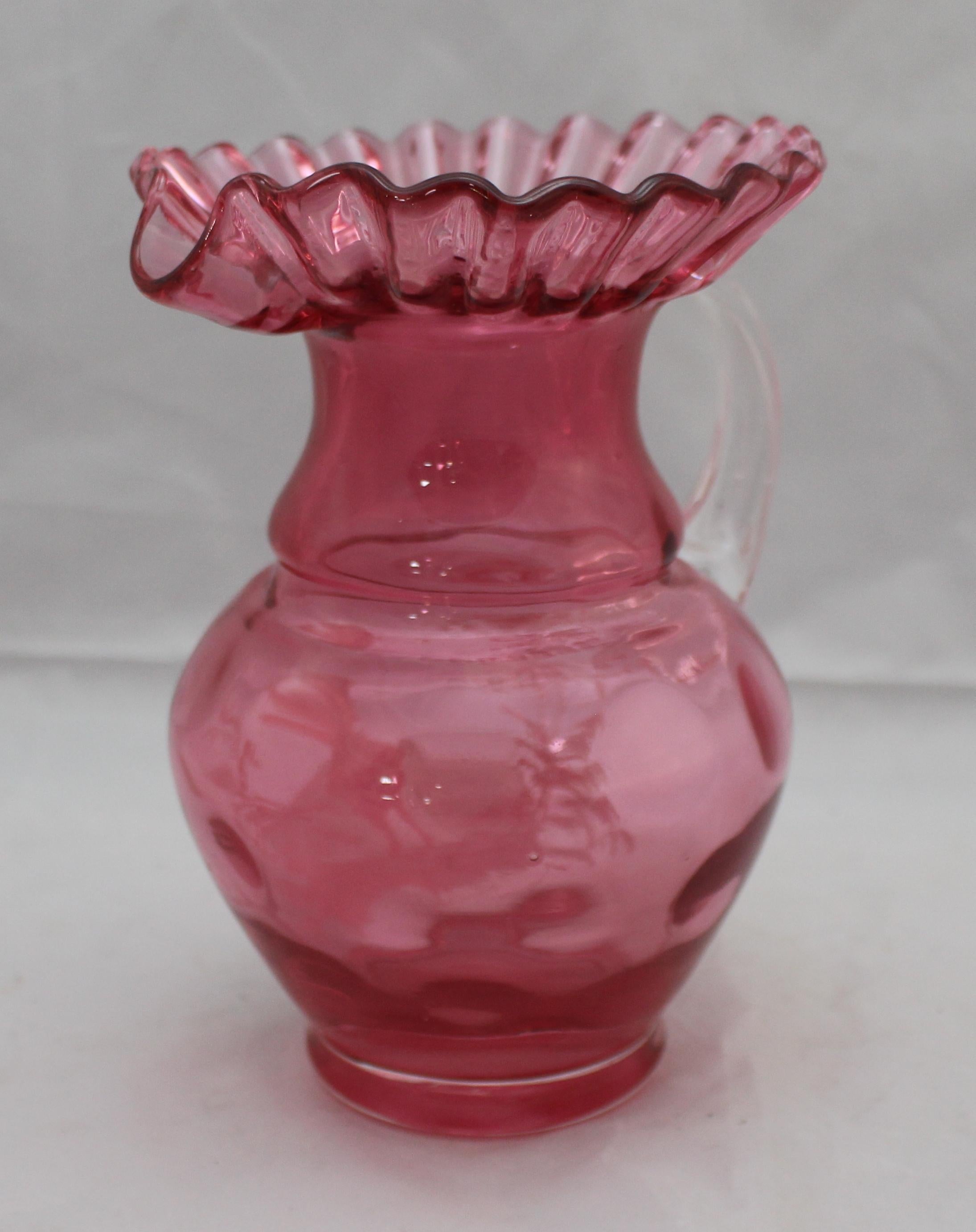 Period 19th century
Decoration cranberry glass, Mary Gregory painting
Measures: Width 15 cm / 6 in
Depth 12 cm / 4 3/4 in
Height 19 cm / 7 1/2 in.
Condition: Very good original condition. No chips or cracks. A few small air bubbles to glass as