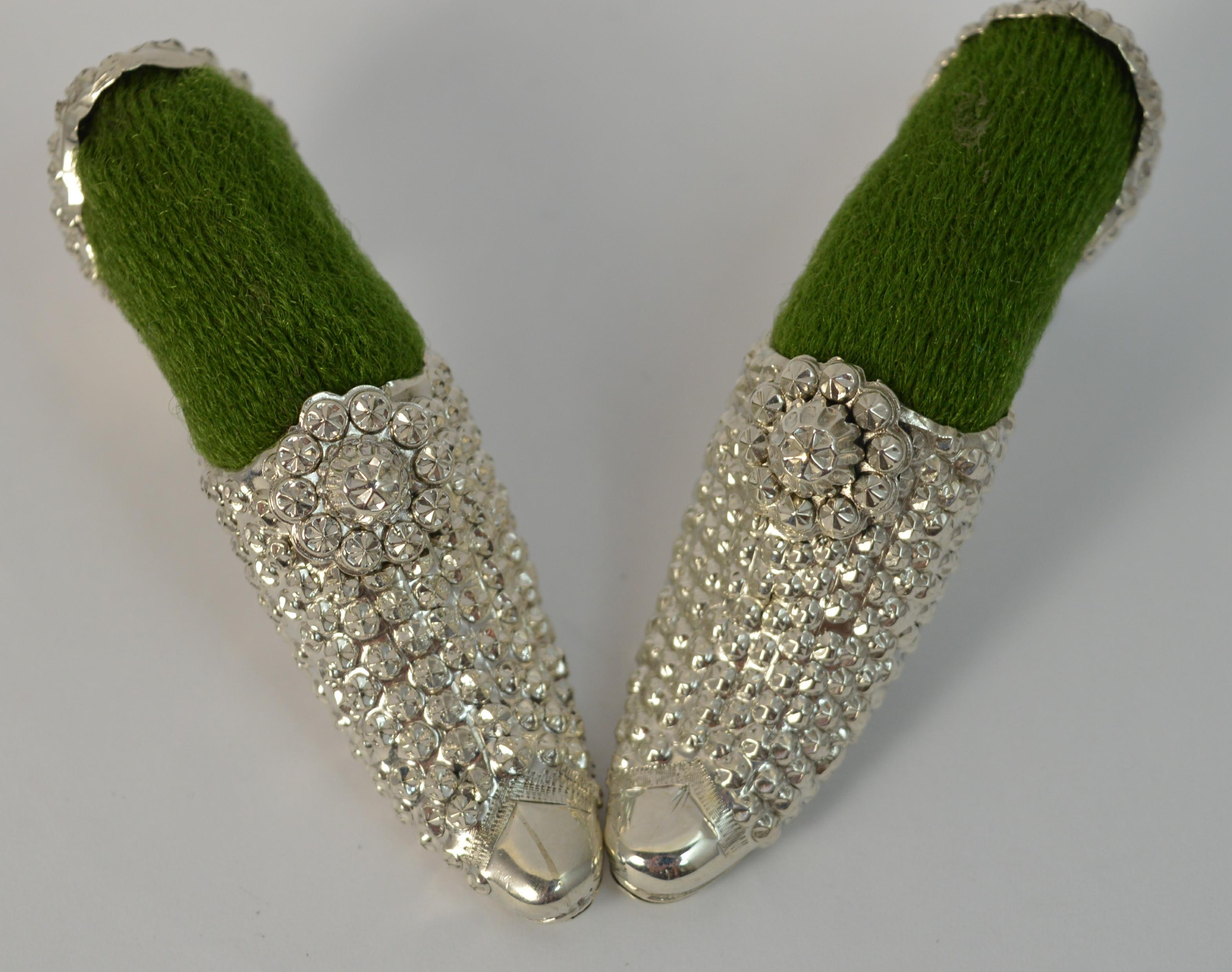 

A superb pair of antique solid silver pin cushions. Both English made with matching designs to the shoe throughout. Green inserts.

Hallmarks ; lion, Birmingham assay, date letter y and b, makers initials 
Size ; 6.5cm long 2.7cm tall