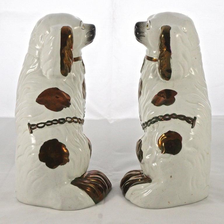 Victorian Pair of Staffordshire Pottery Copper Lustre Split Leg Dog