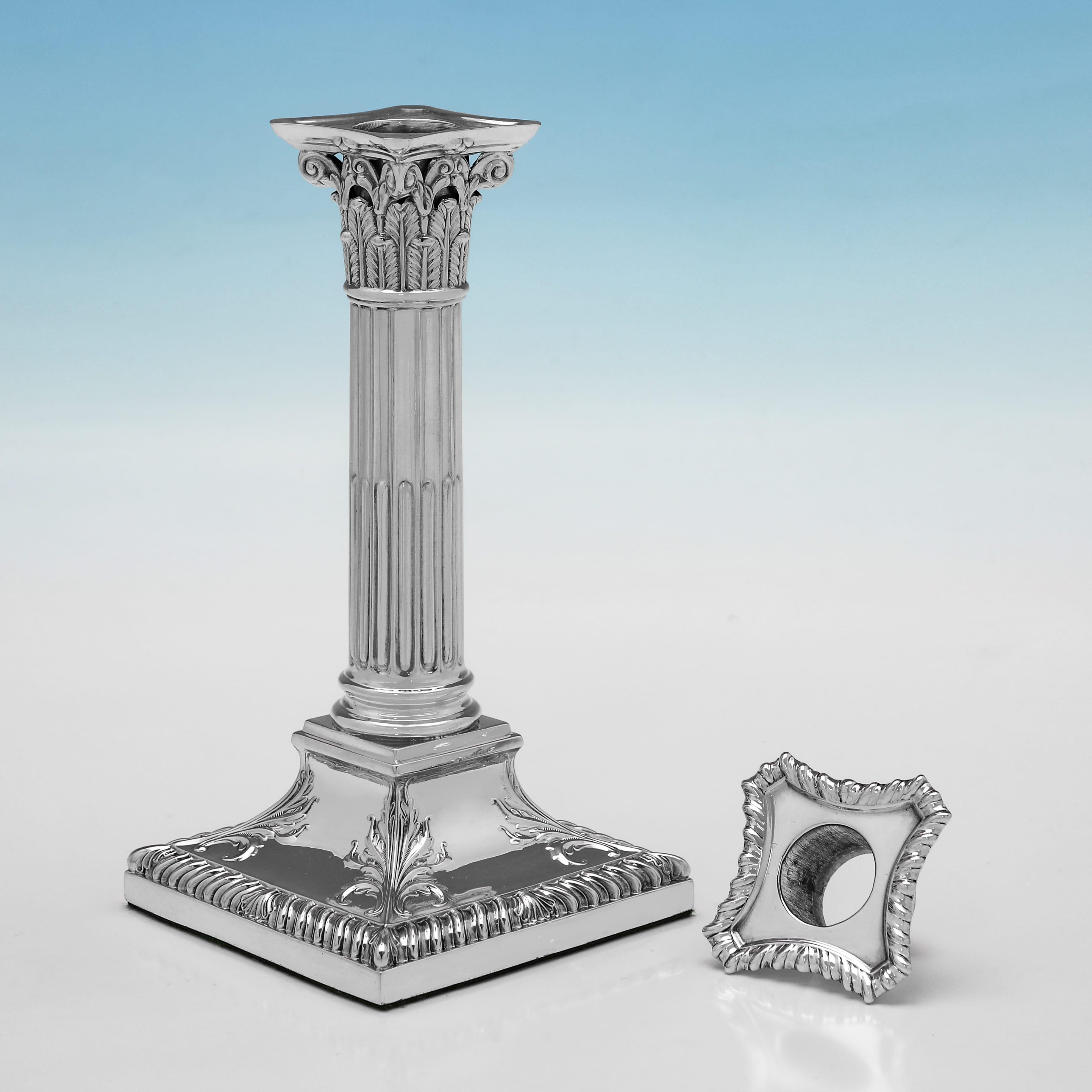 English Victorian pair of sterling silver candlesticks made by Mappin & Webb in 1898