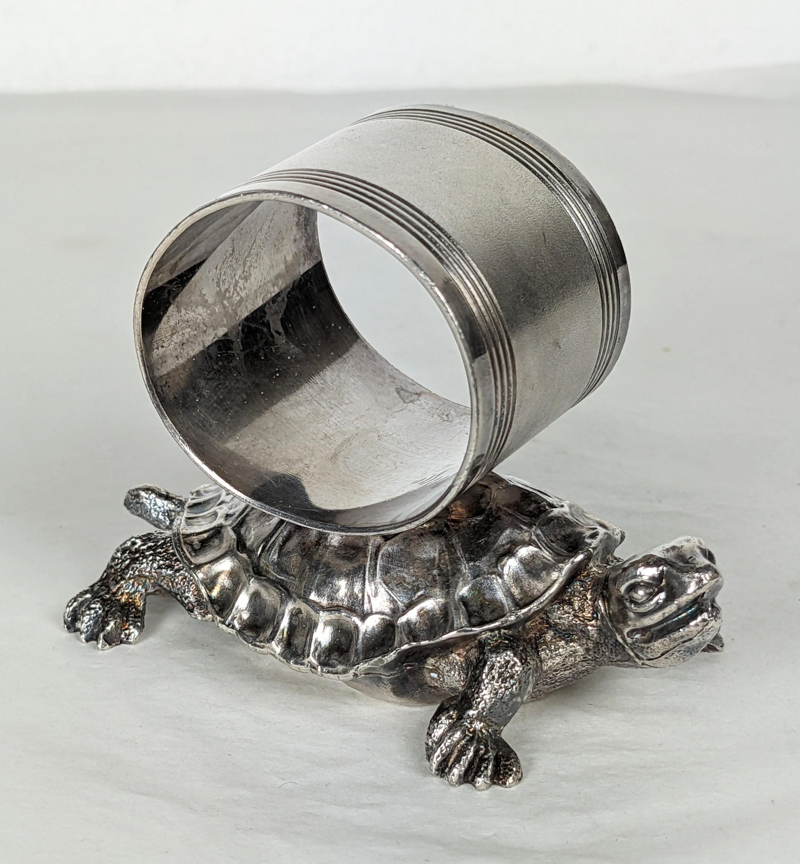 Rare Victorian Pairpoint Figural Silverplate Napkin Ring. Beautifully modeled turtle holding the napkin ring made by the Pairpoint Co. New Bedford, Massachusetts, circa 1890.