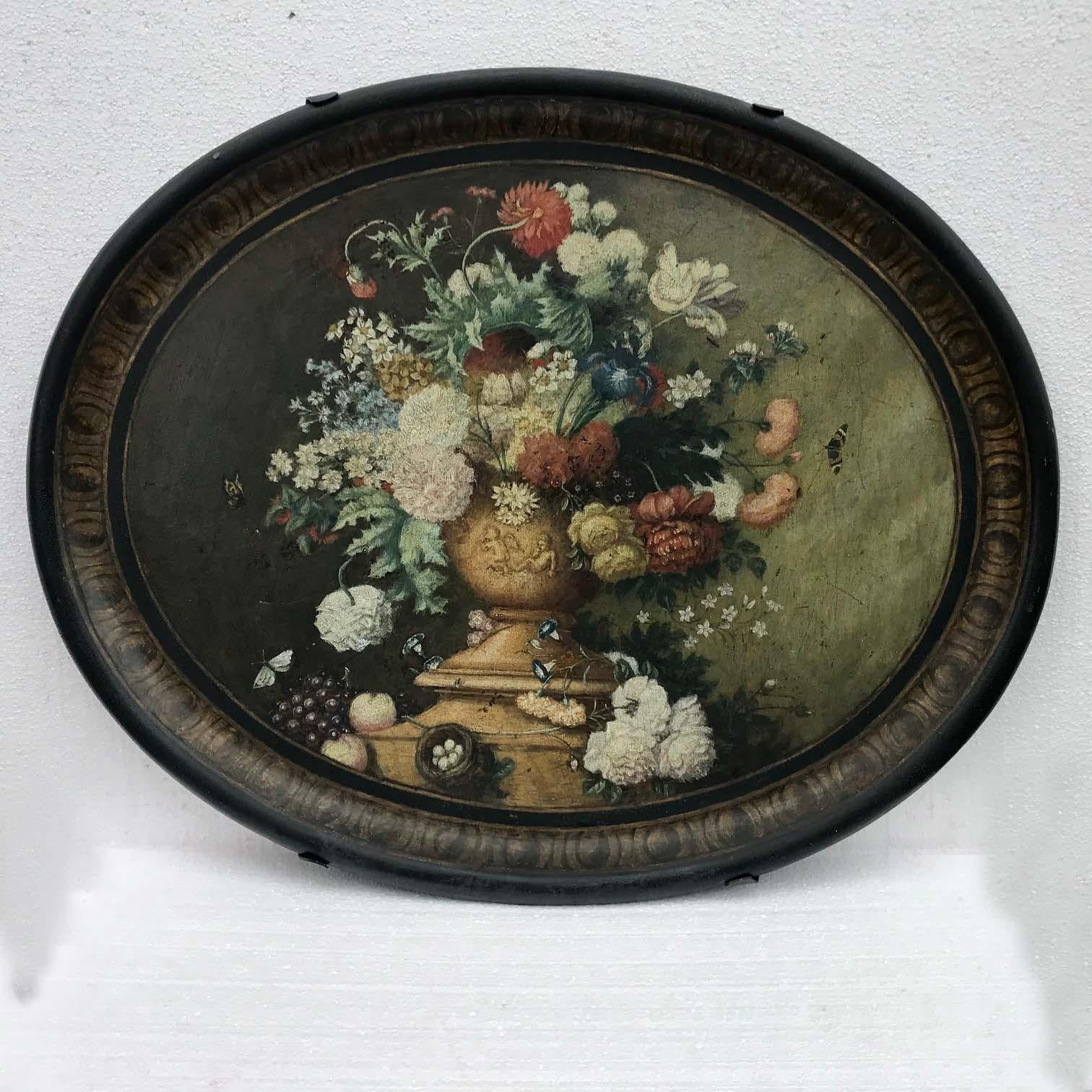 This oval tray is of good large size, often we mount them on stands. In this case, however, the painting is of considerable decorative quality and is very much the kind of still life painting that should be on a wall rather than under a drink.