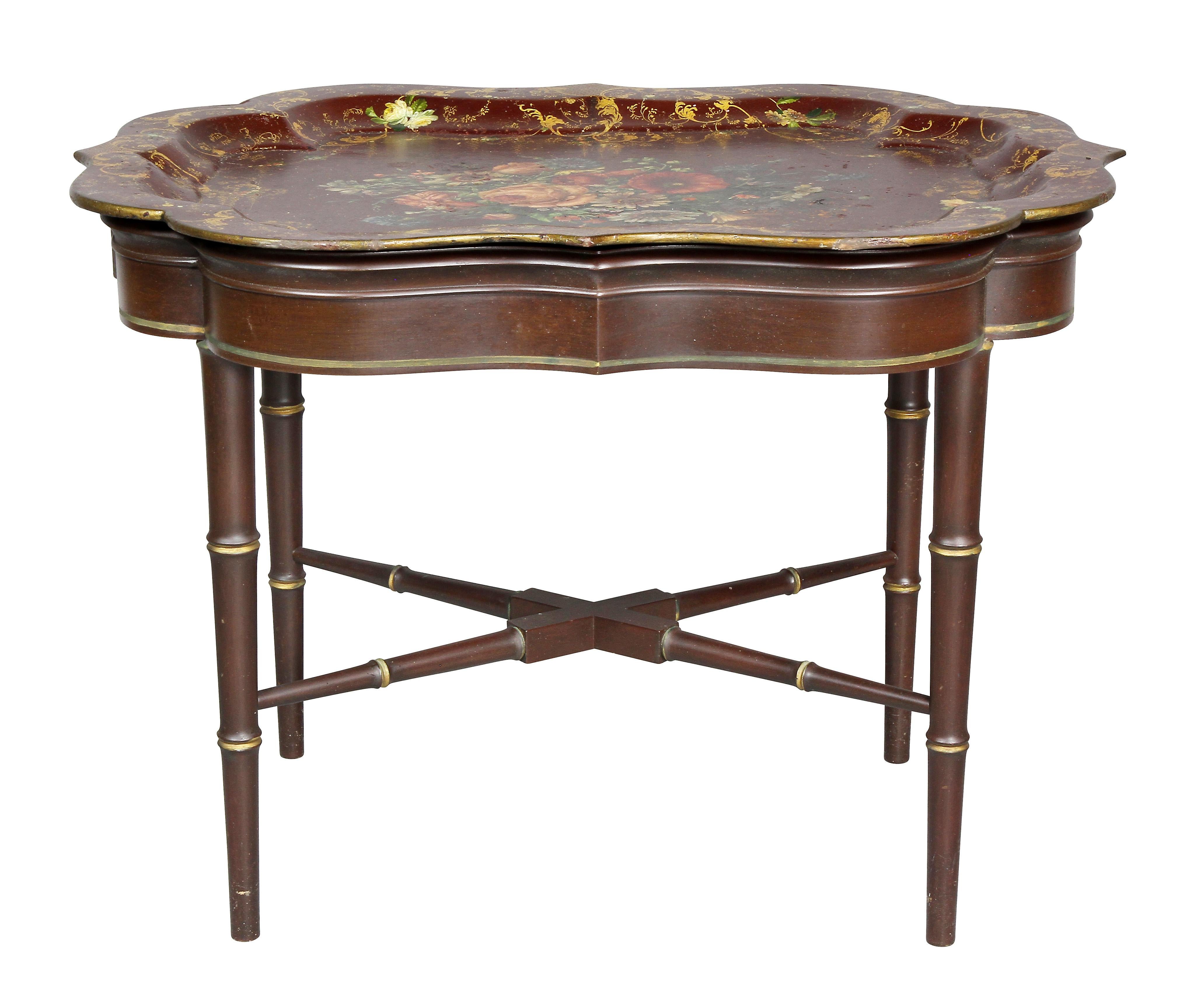 Scalloped shape reddish brown tray with vibrant floral design, later faux bamboo base. Provenance; Estate of John Volk. Noted Palm Beach architect.