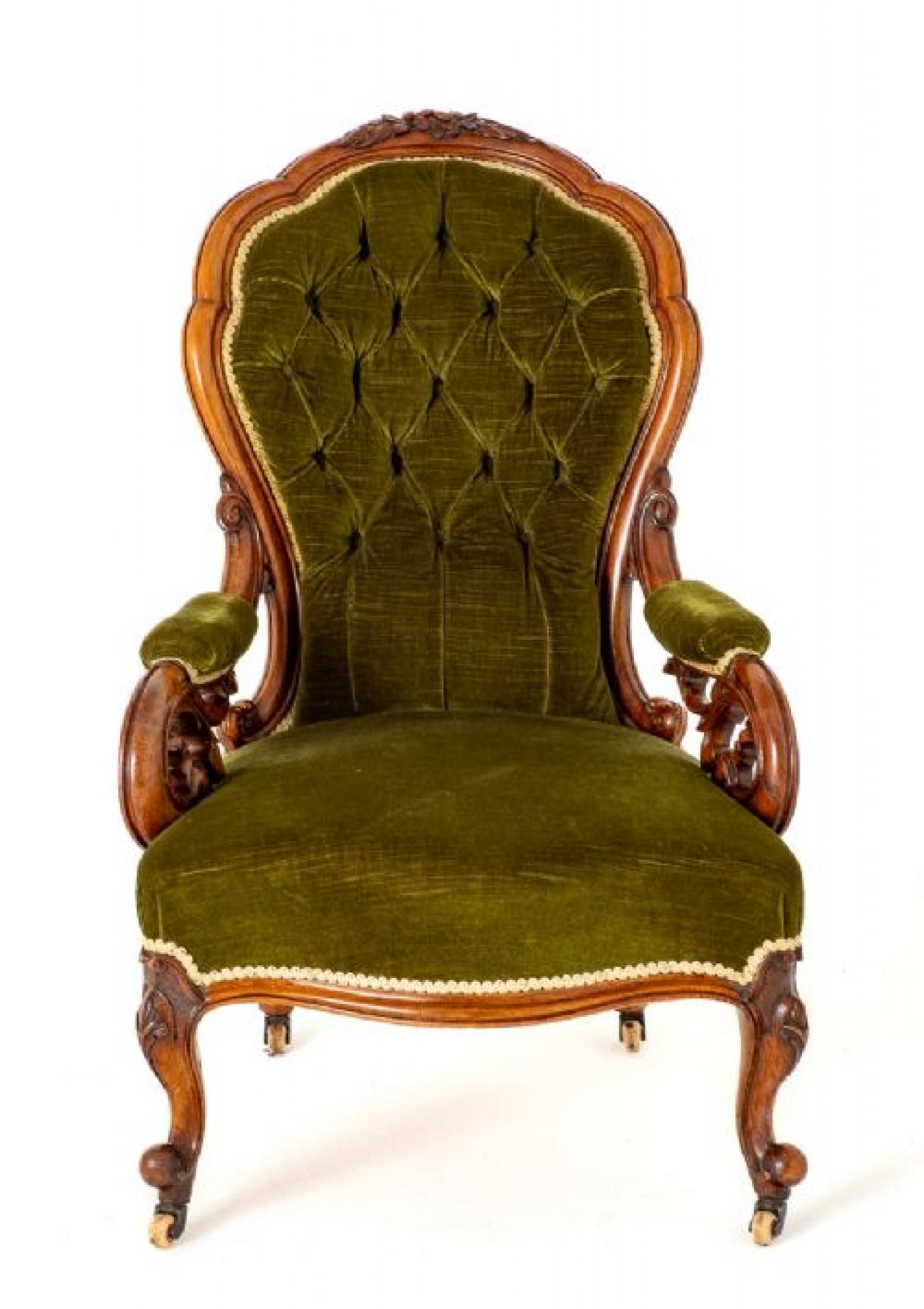 Victorian Walnut Open Arm Chair.
This Arm Chair is Raised upon Cabriole Legs with Carved Toes and Carved Knees and Retain the Original Porcelain Castors.
Circa 1860
The Swept Arms Having Shaped and Carved Detail and Padded Elbow Supports.
The Shaped