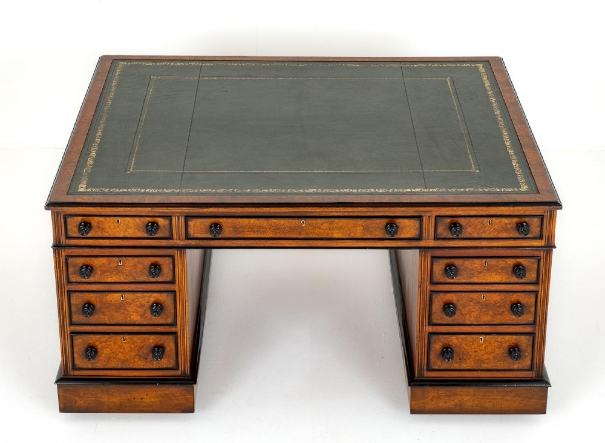 Gorgeous Victorian partners desk in burr walnut
Circa 1870
This Wonderful Desk has a Green Leather Writing Surface (replacement) with hand applied gilt and blind tooling and Burr Walnut Crossbanding.
The intricate details, such as carved accents,