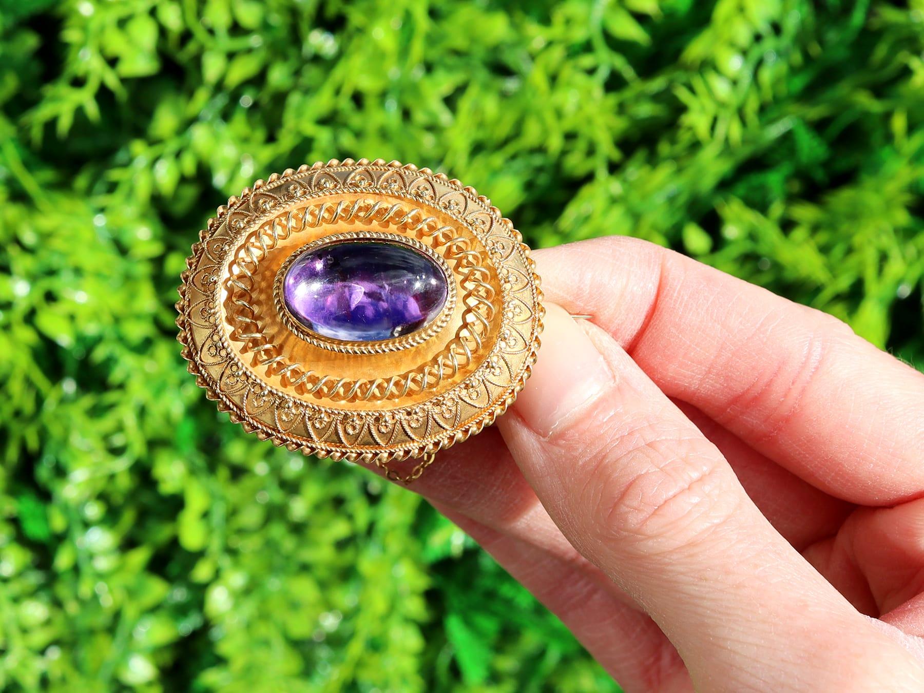 A fine and impressive antique Victorian paste and 15 karat yellow gold brooch; part of our antique jewelry and estate jewelry collections.

This impressive antique Victorian brooch has been crafted in 15k yellow gold.

The antique gold brooch