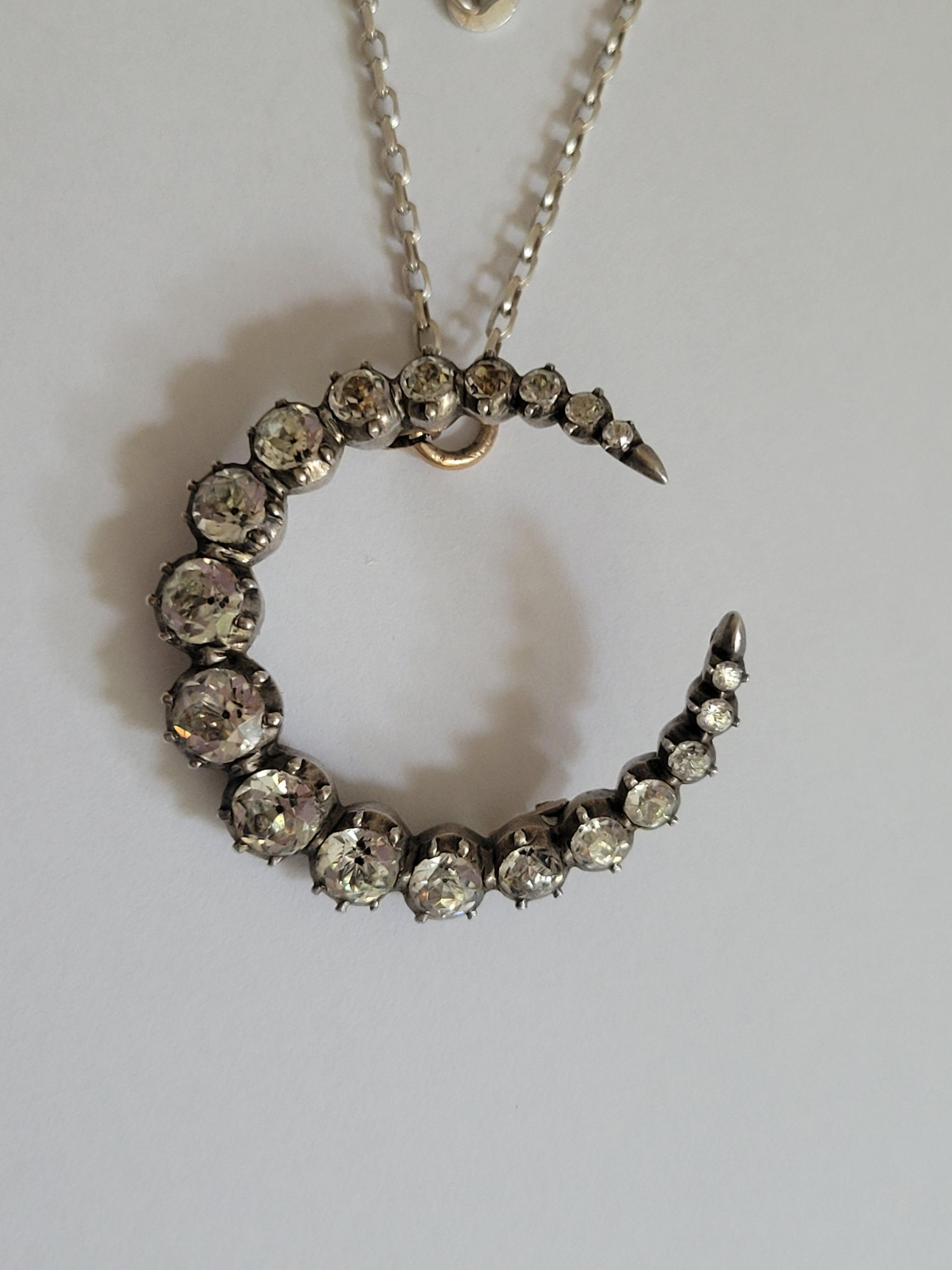 A Beautiful Antique Victorian late 1800s Silver and Paste crescent Pendant necklace. This is a brooch conversion on later Sterling Silver chain. 
Total length of the chain 24